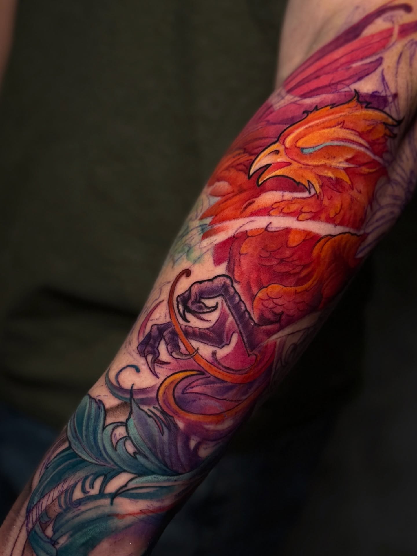 Phoenix new school tattoo on the forearm by James Hall