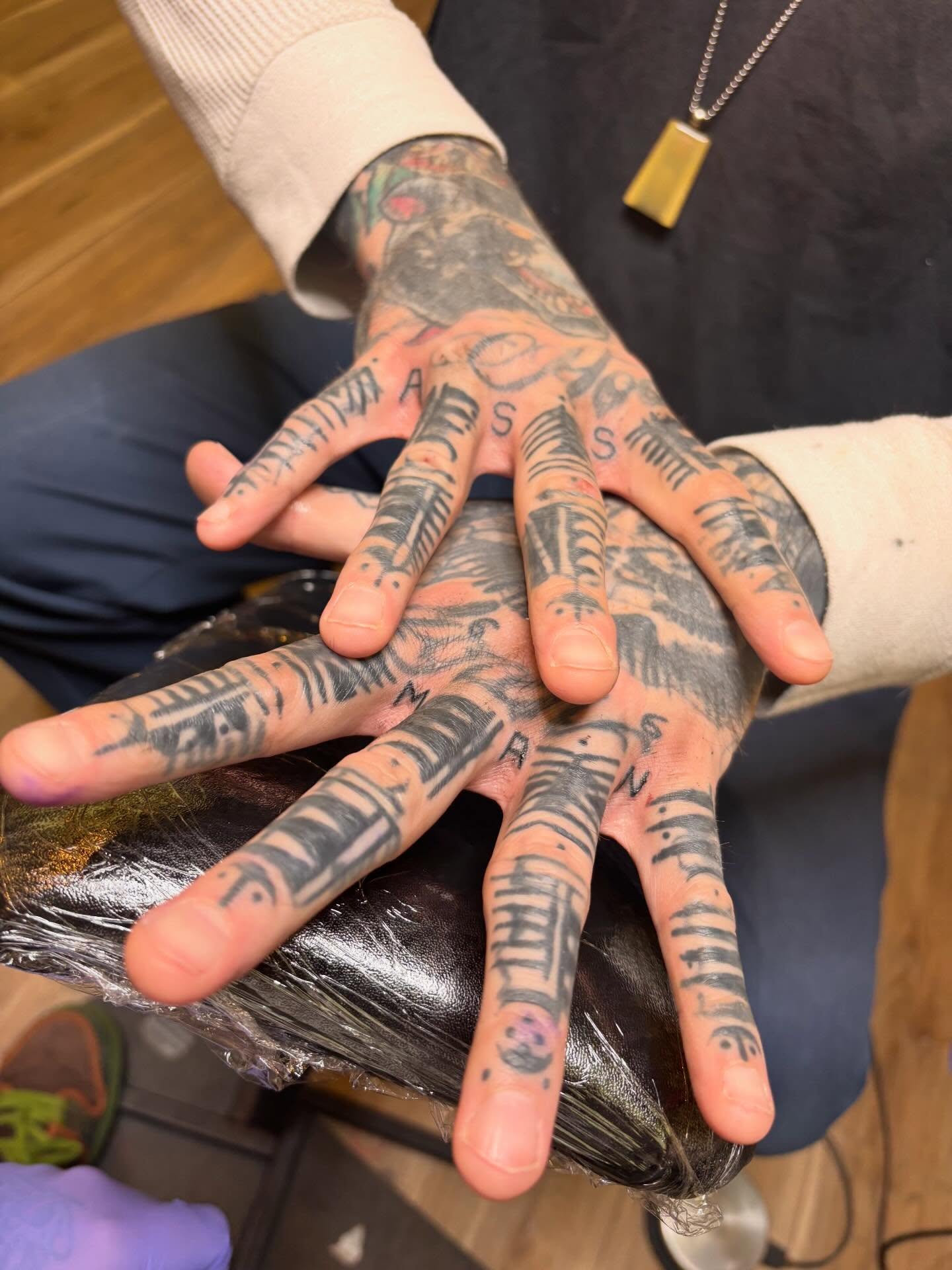 Finger tattoos black and grey tattoo on the hand by Steve Reid