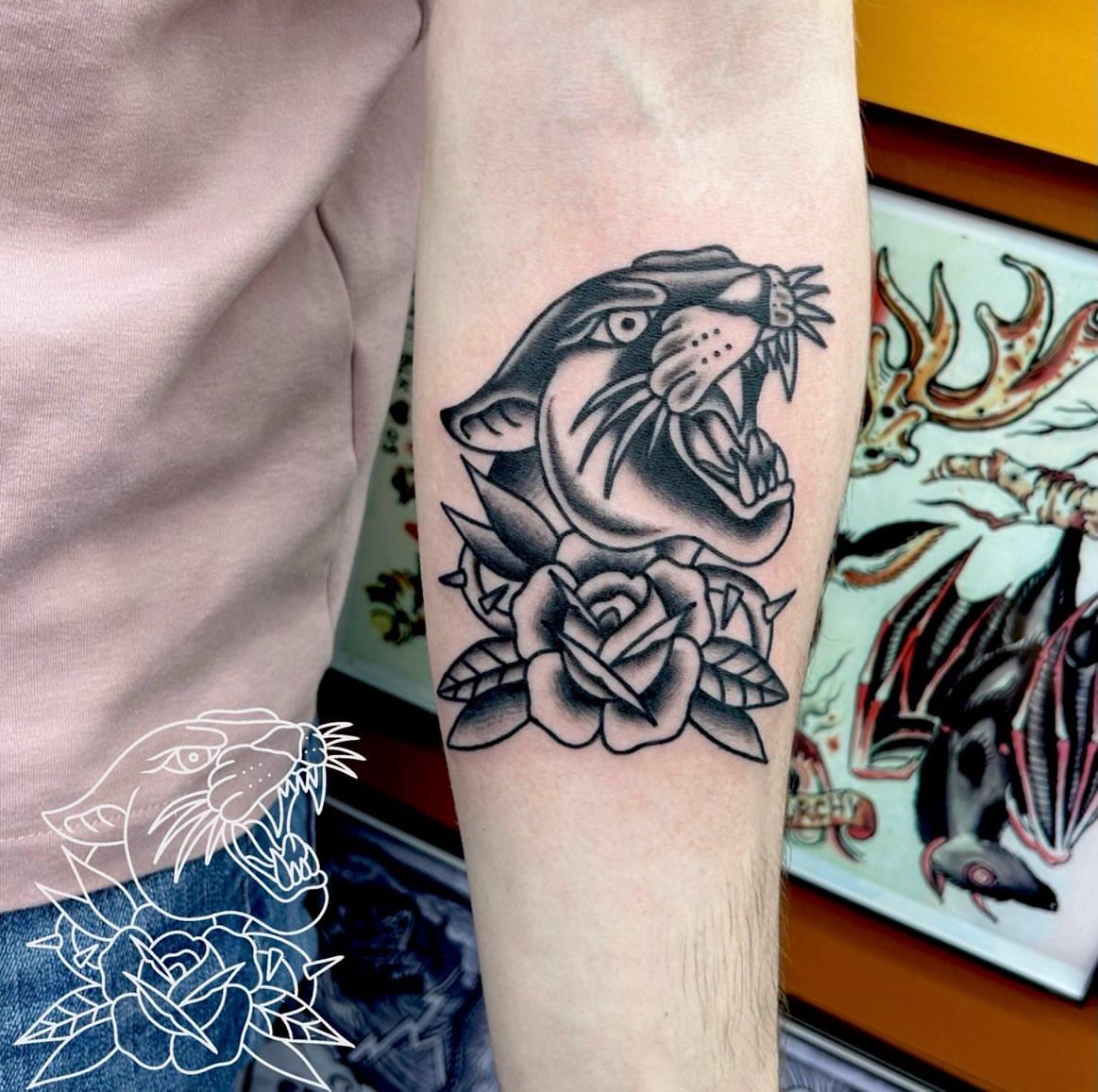 Panther and roses American traditional tattoo on the forearm by Lip™