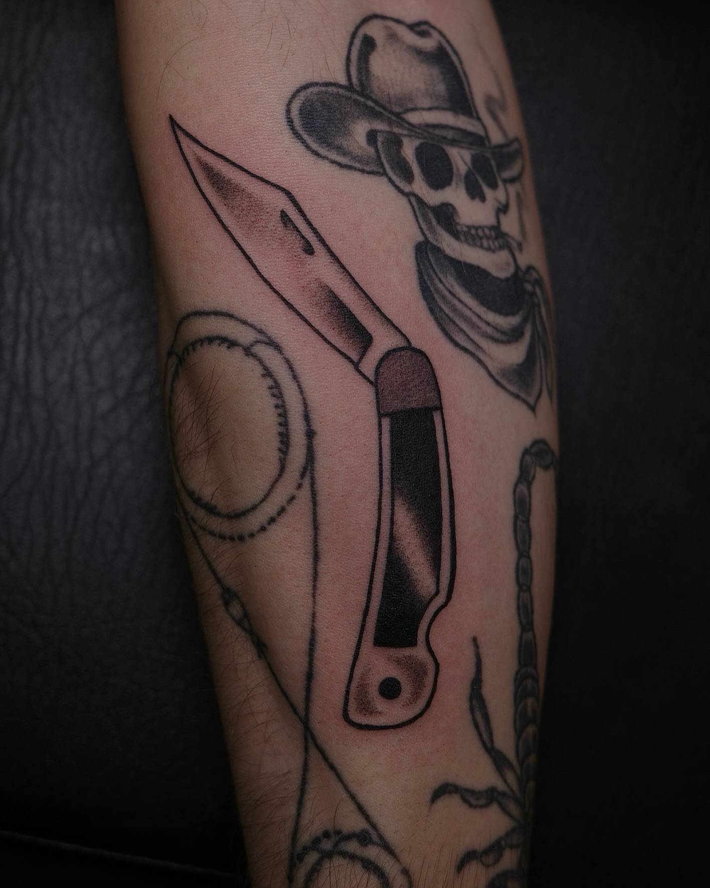 Knife and skull realism tattoo on the forearm by Sequoia Rose, Portland, Oregon