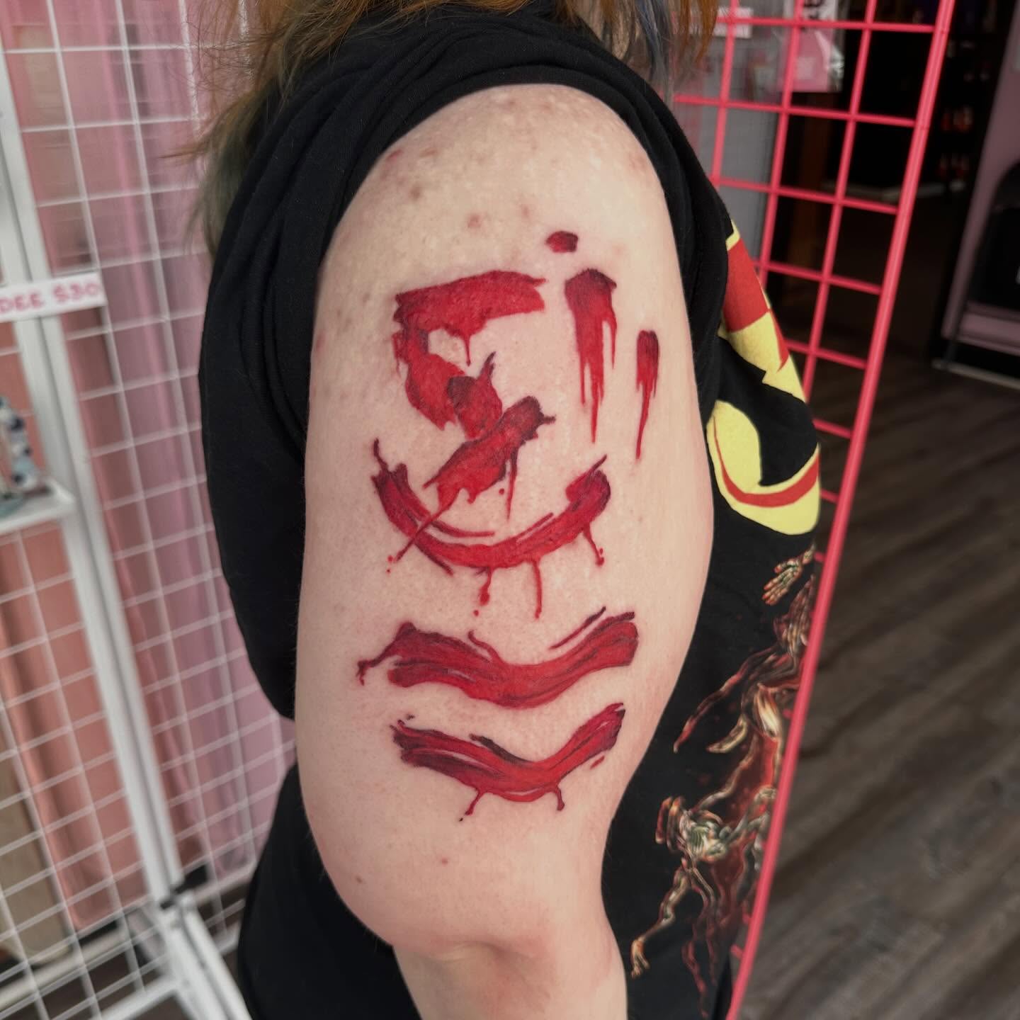 Blood splatter realism tattoo on the shoulder by ✦ Louie ✦, Sterling Heights, Michigan