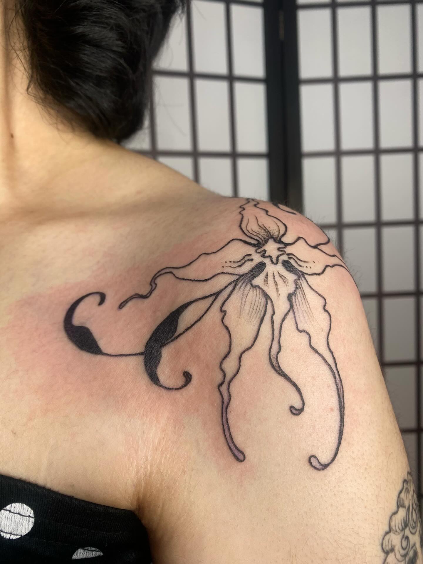 Octopus black and grey tattoo on the shoulder by sarah 🗝️