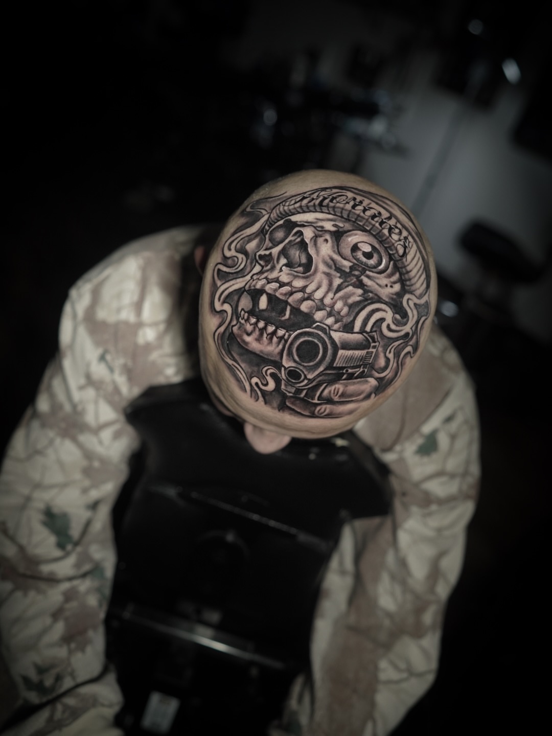 Skull and mechanical elements geometric tattoo on the head by Niko Hosk Cataldo
