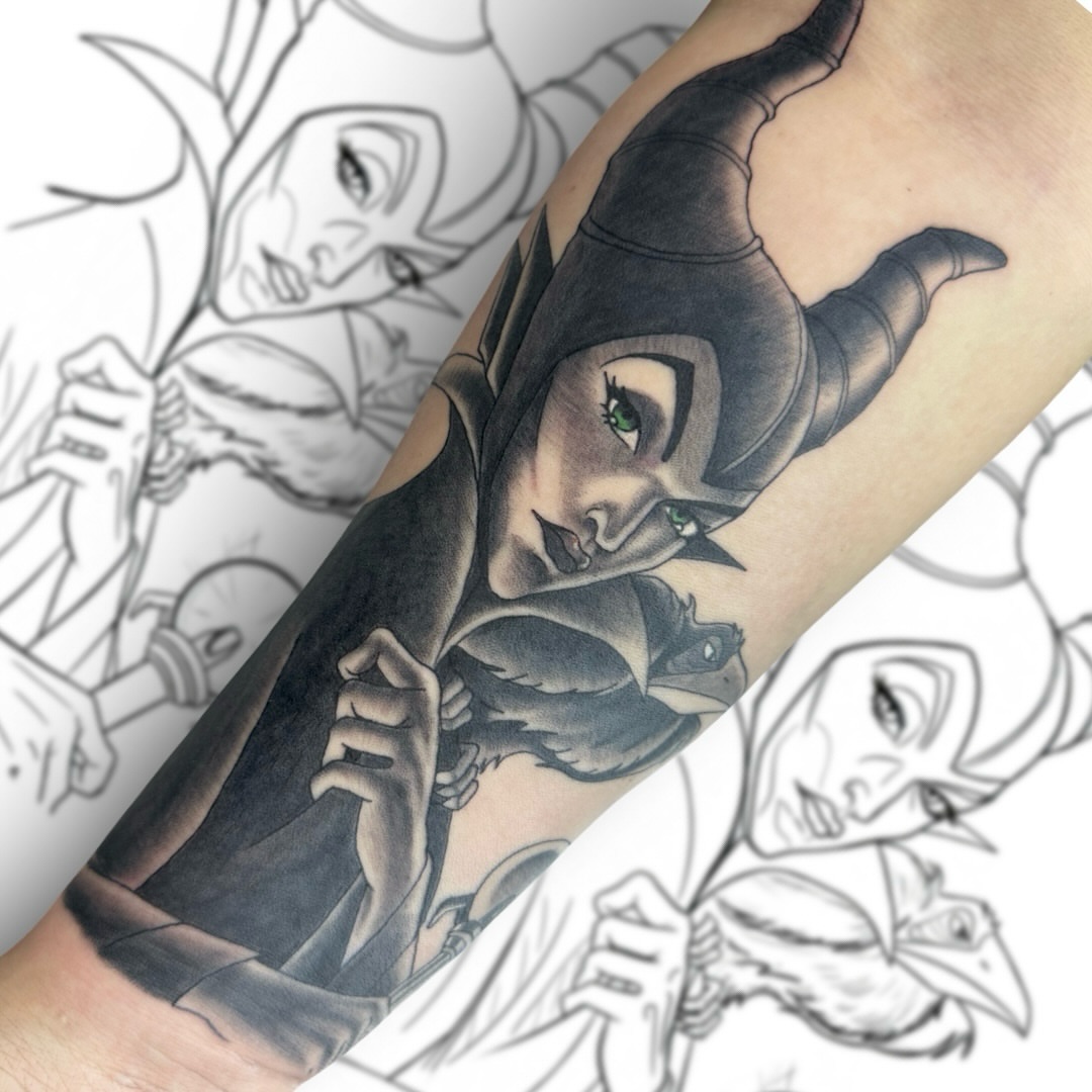 Maleficent black and grey tattoo on the forearm by Victor Campos