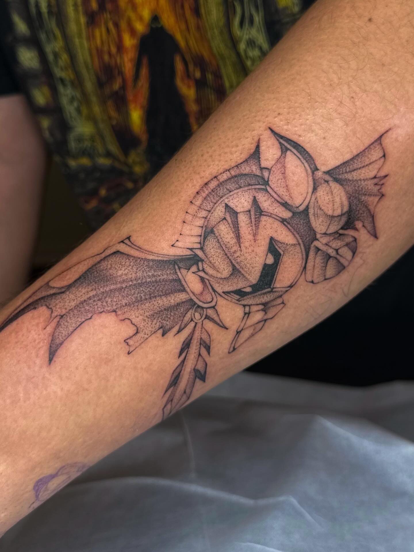 Owl dotwork tattoo on the forearm by Maggie Angulo