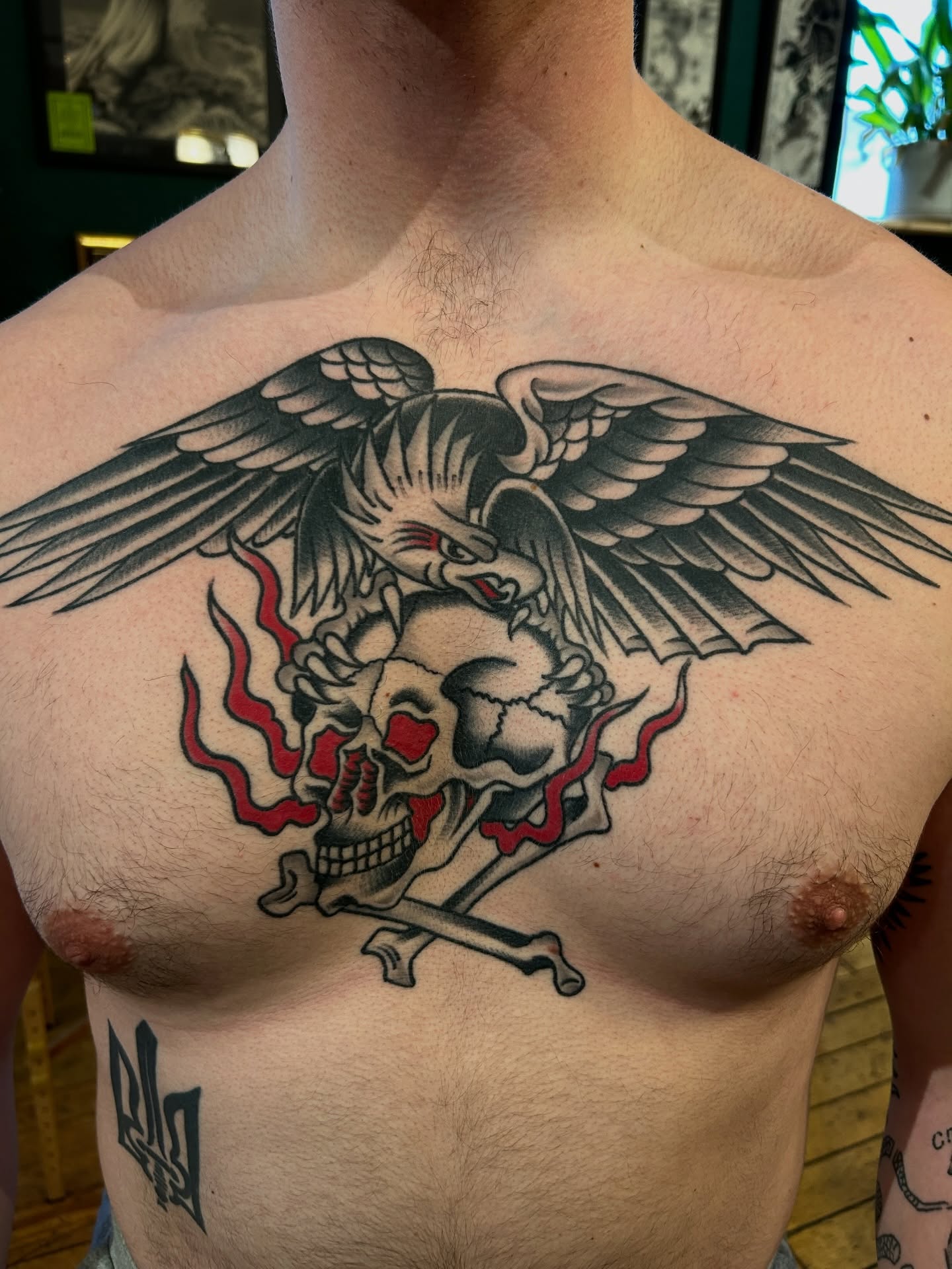 Skull and eagle American traditional tattoo on the chest by Eric Caudill, Indianapolis, Indiana