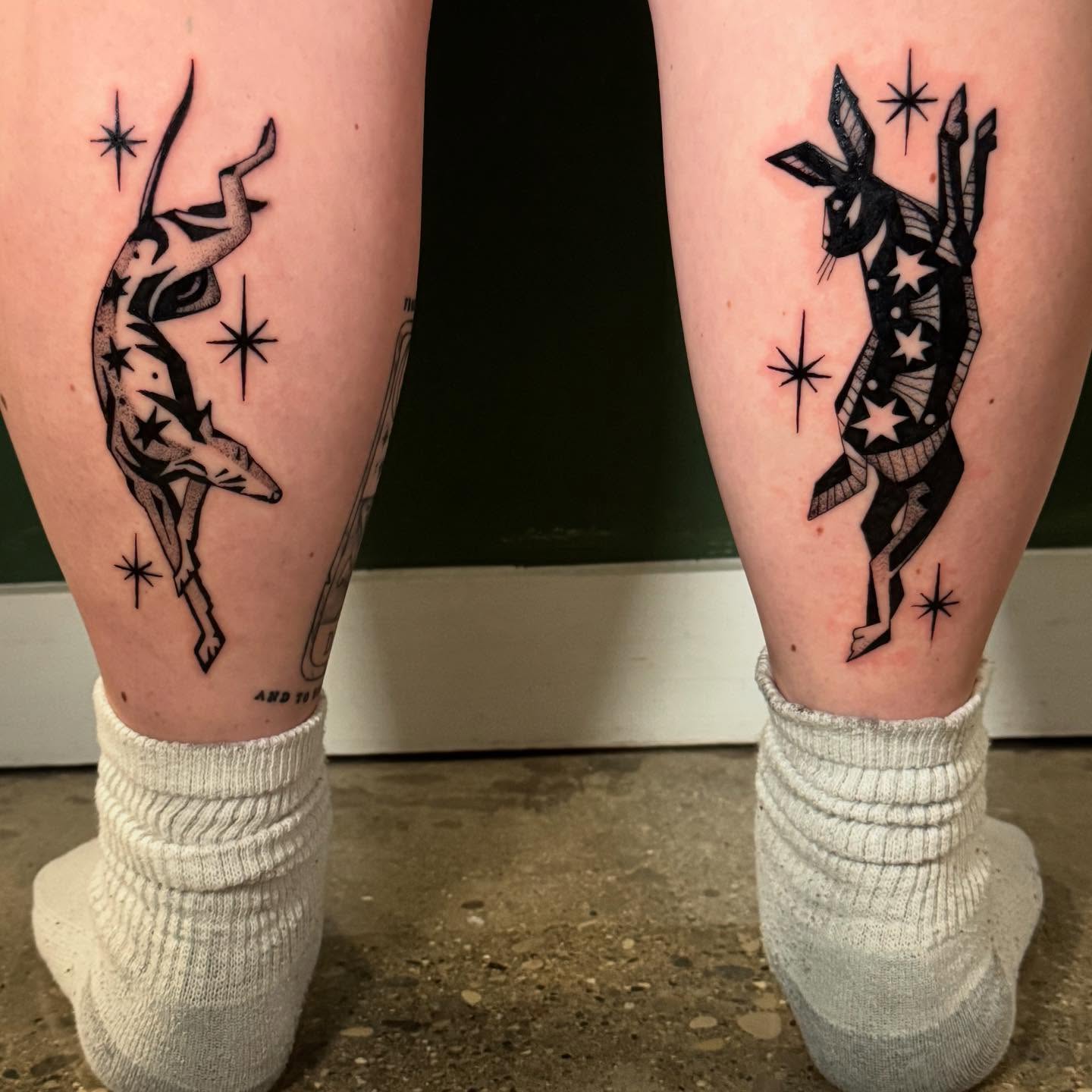 Deer and stars black and grey tattoo on the leg by C.J. Pennington