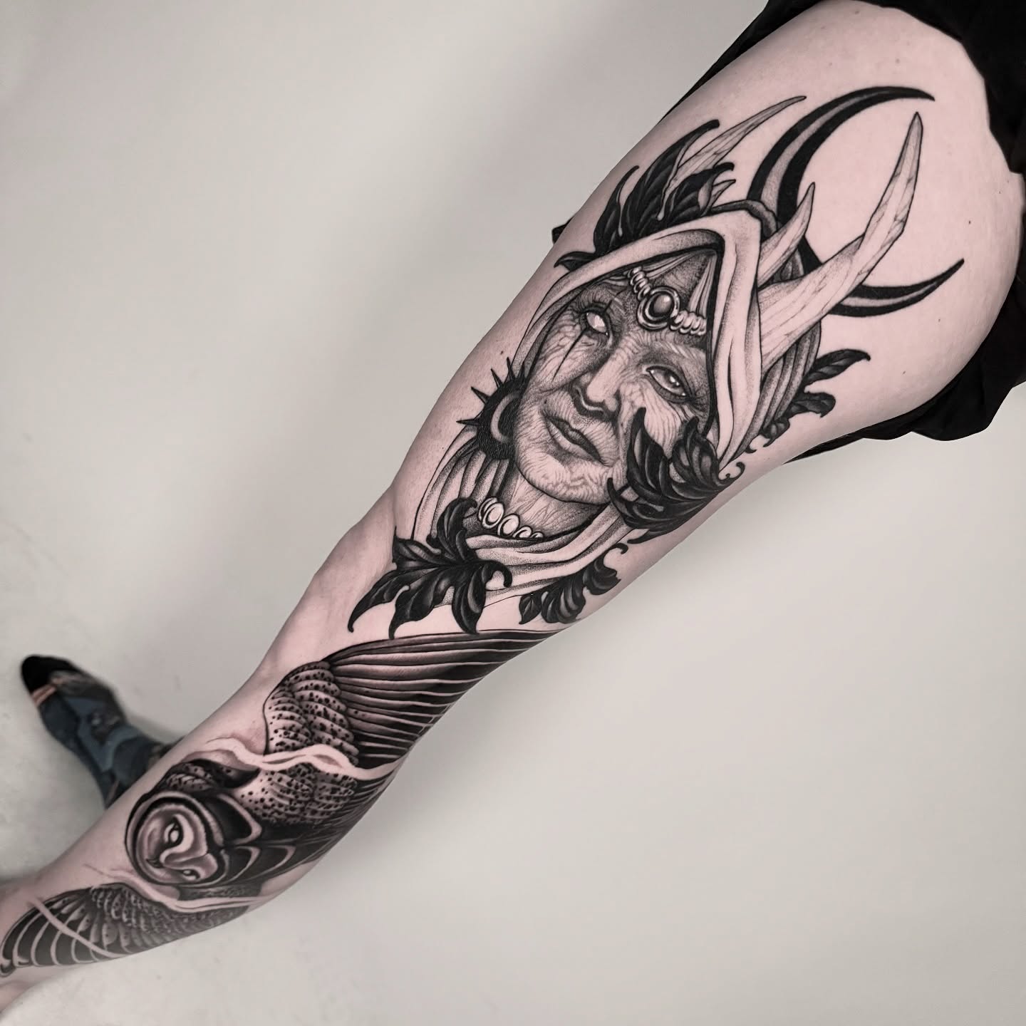 Woman's face with antlers realism tattoo on the forearm by Tommy Sisneros