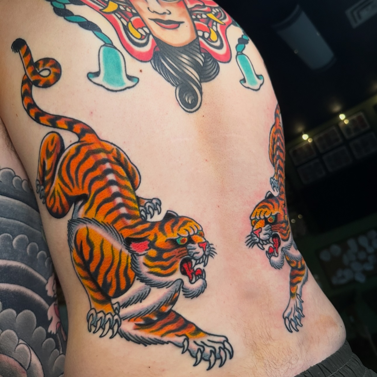 Tiger American traditional tattoo on the shoulder by Schyler Ames, Canal Fulton, Ohio