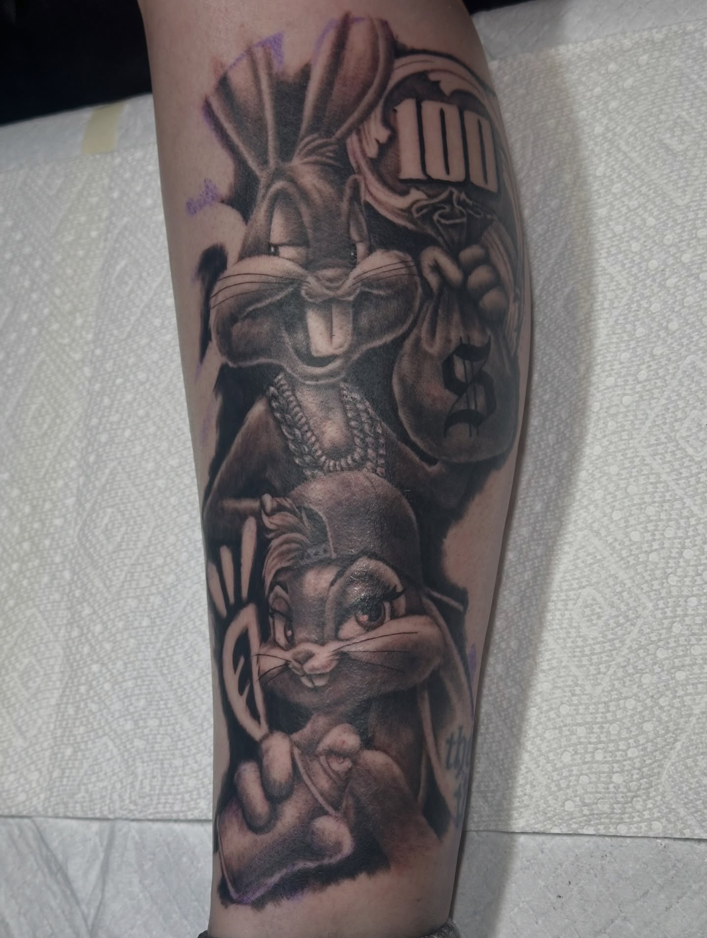 Looney tunes characters black and grey tattoo on the forearm by (Joshua) Van Cummings