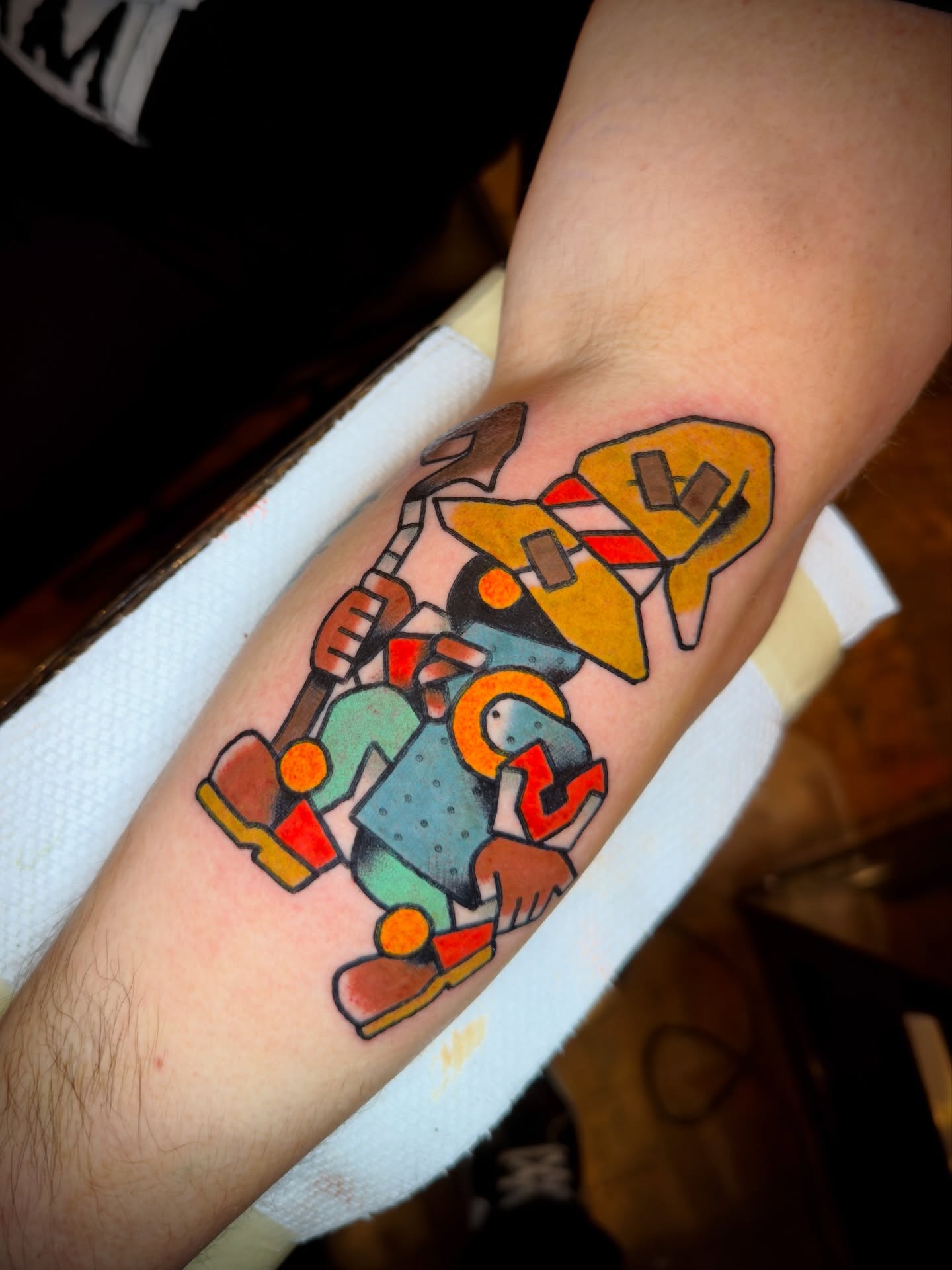 Robotic figure American traditional tattoo on the forearm by โ L O S โ ๐ฒ๐ฝ