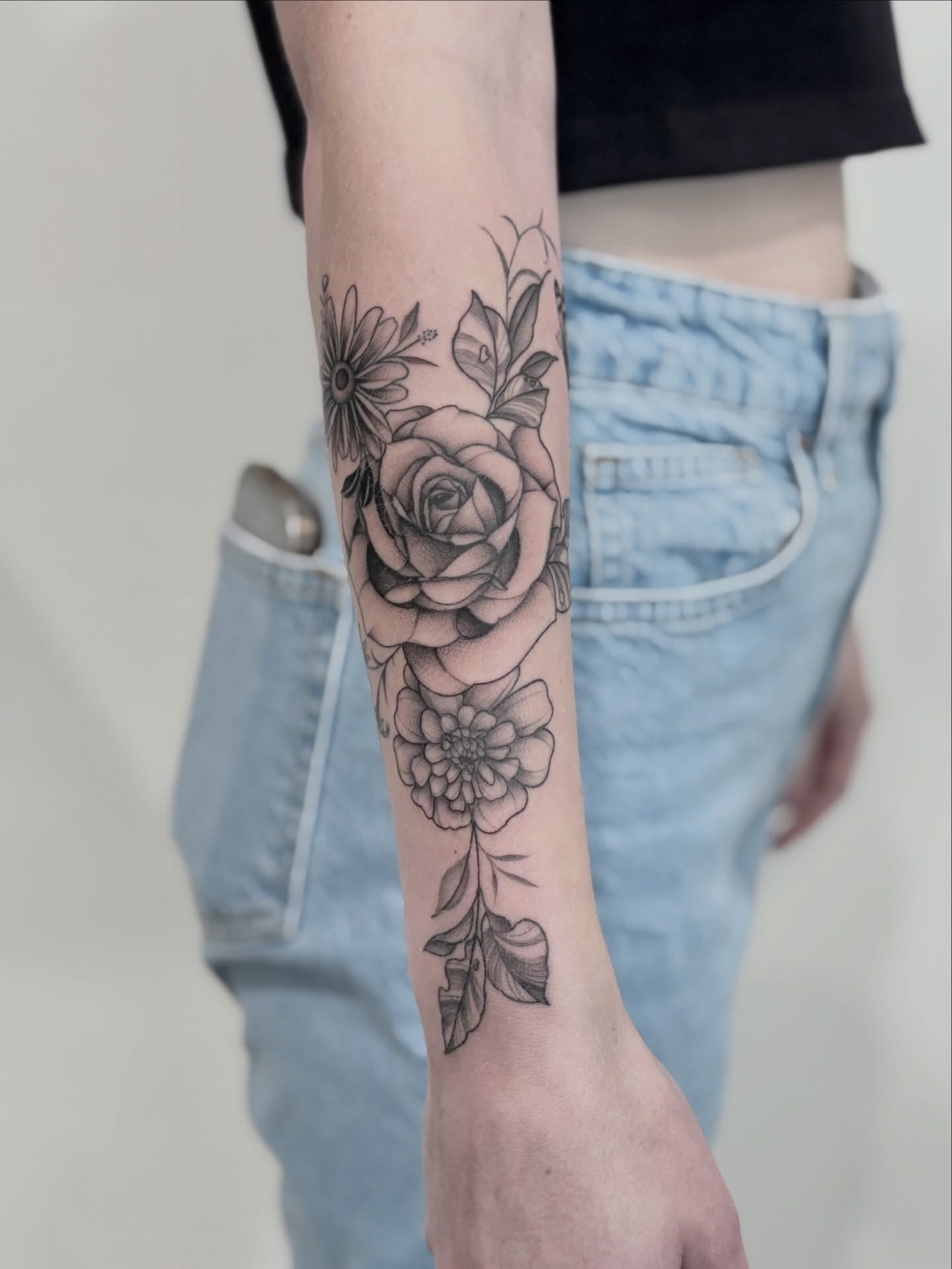 Floral arrangement realism tattoo on the forearm by Elise Lamoureux- Tattoo Artist, Airdrie, Alberta