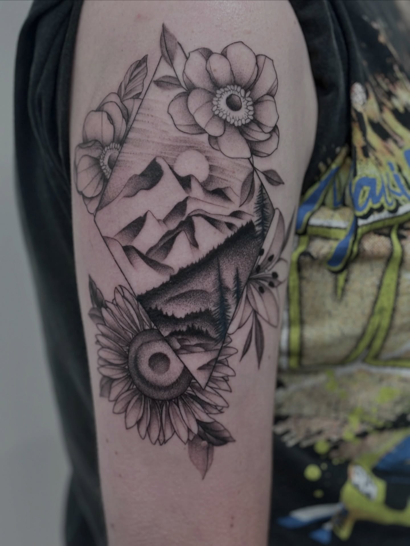 Geometric floral landscape geometric tattoo on the forearm by Elise Lamoureux- Tattoo Artist, Airdrie, Alberta