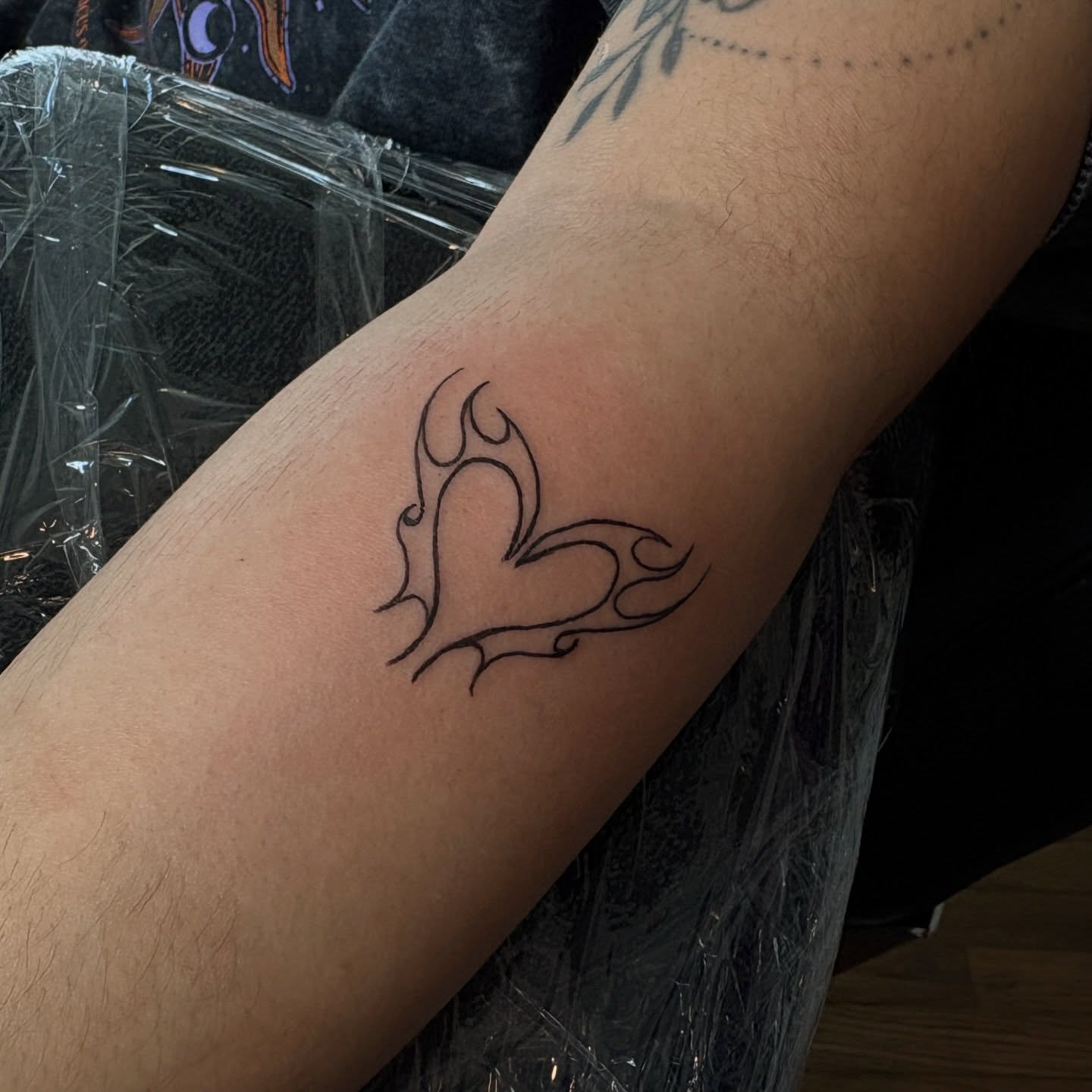 Heart tribal tattoo on the forearm by Emma🌸✨Austin Tattoo Artist