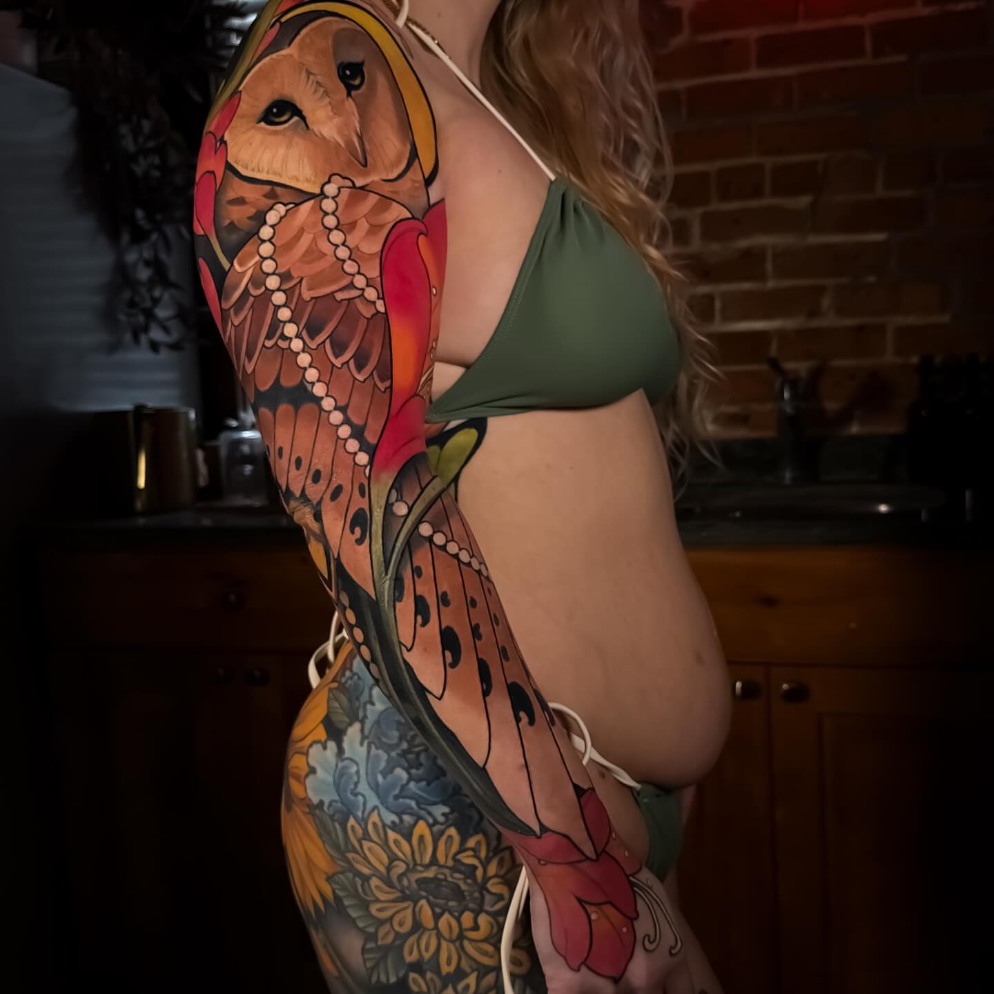 Owl American traditional tattoo on the upper arm by Carlos Valdes ✨ Tattoo Artist in Tampa FL