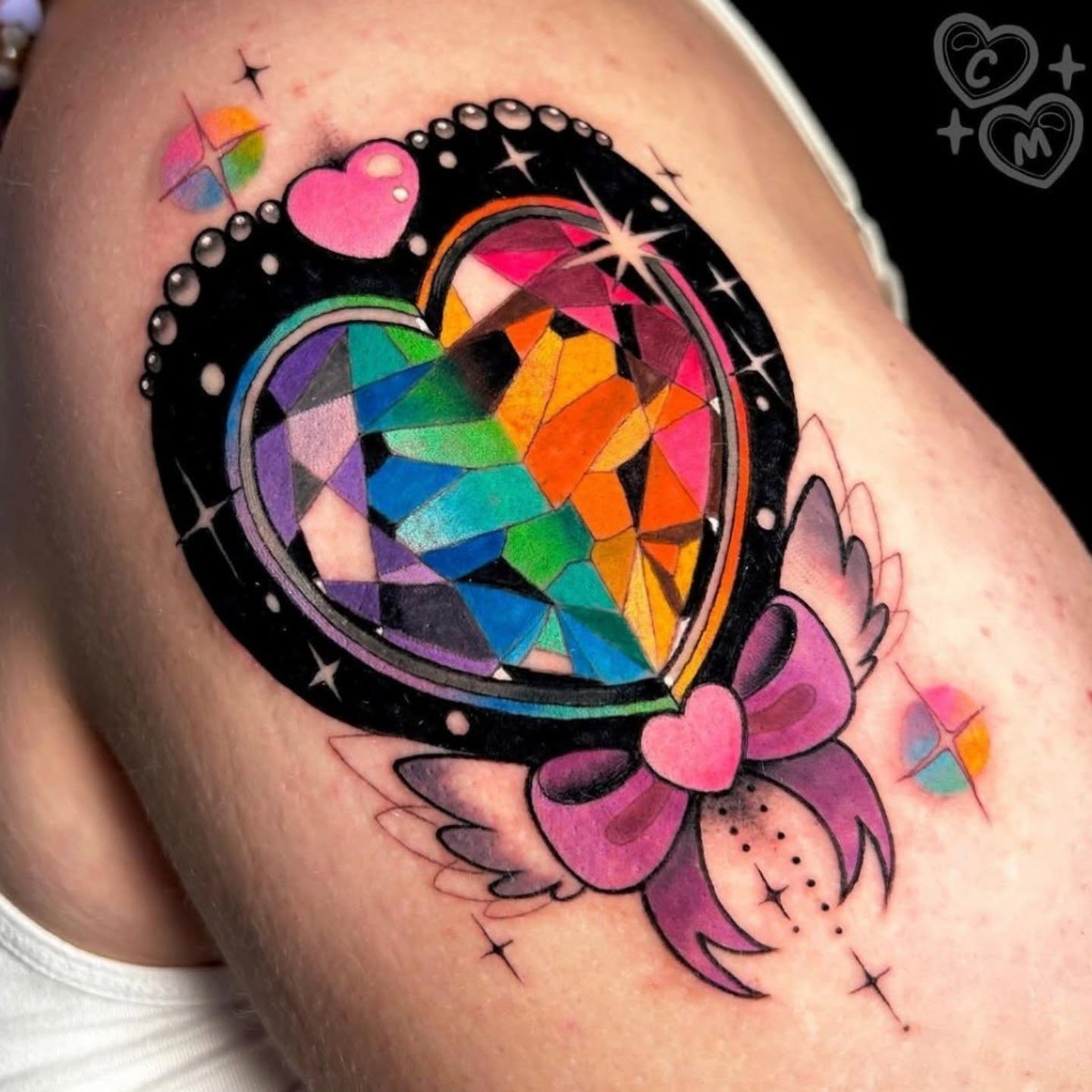 Heart geometric tattoo on the shoulder by Chloe Marie