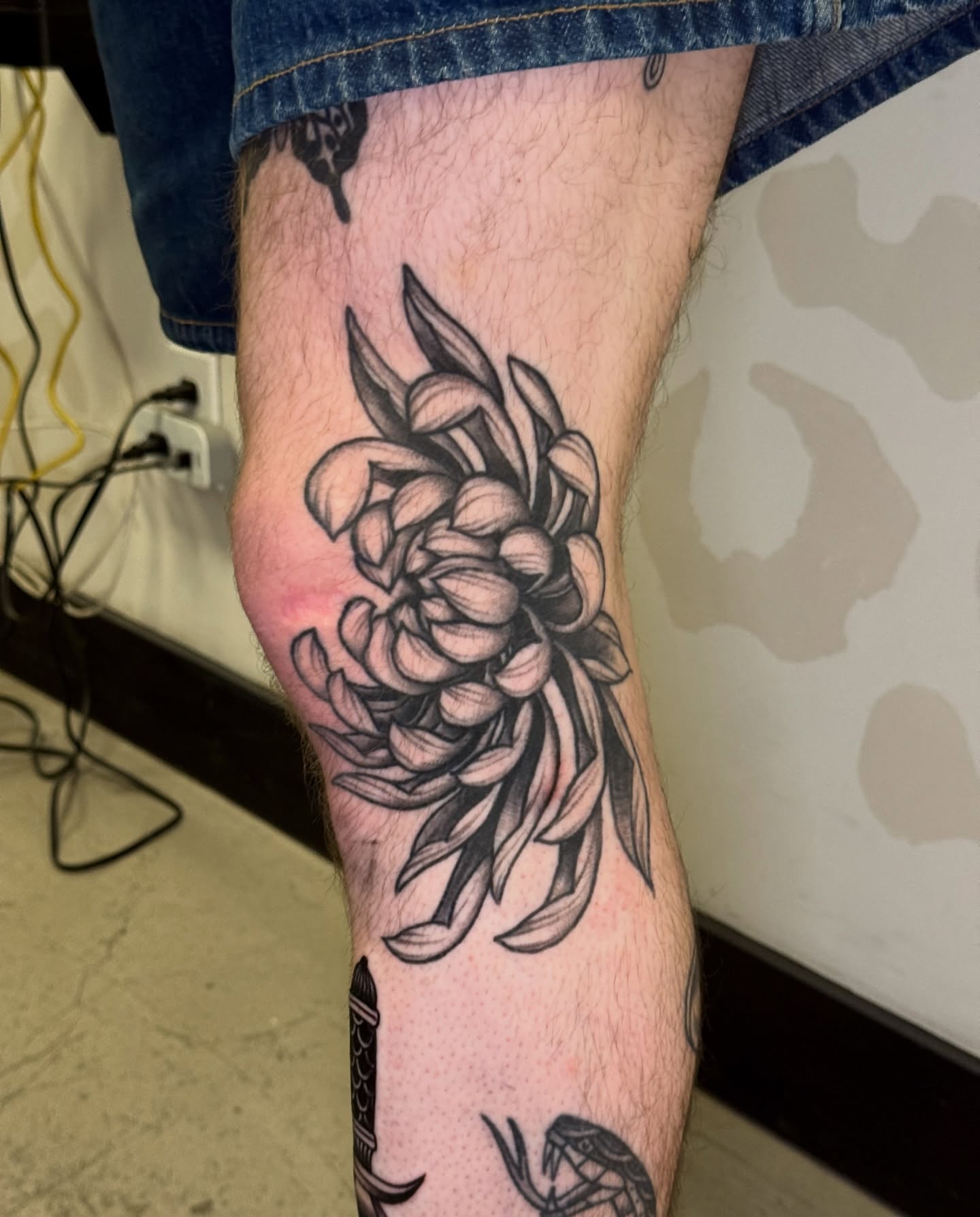 Flower black and grey tattoo on the forearm by Bre Grover, Vancouver, British Columbia