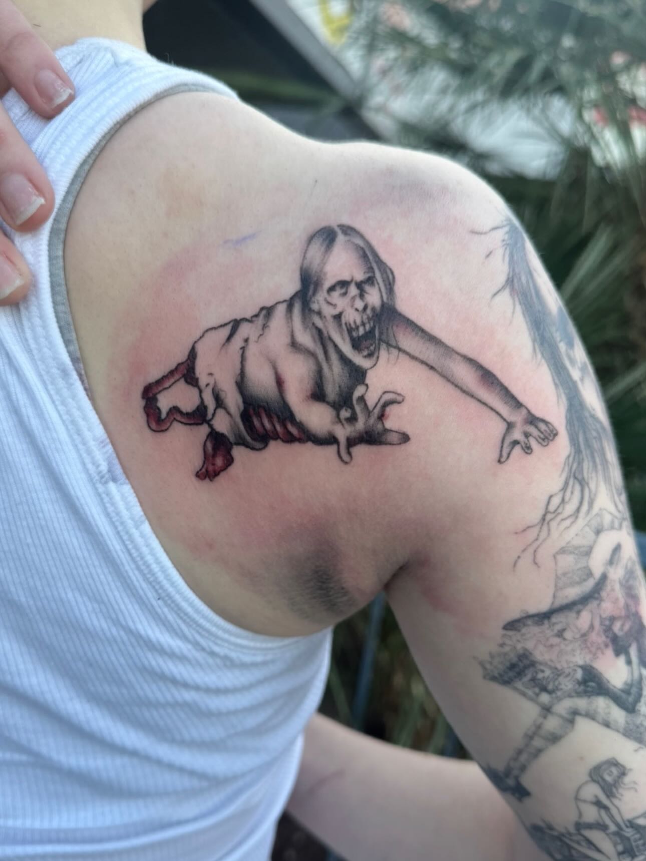 Zombie black and grey tattoo on the shoulder by Bradleigh Pretti🌟