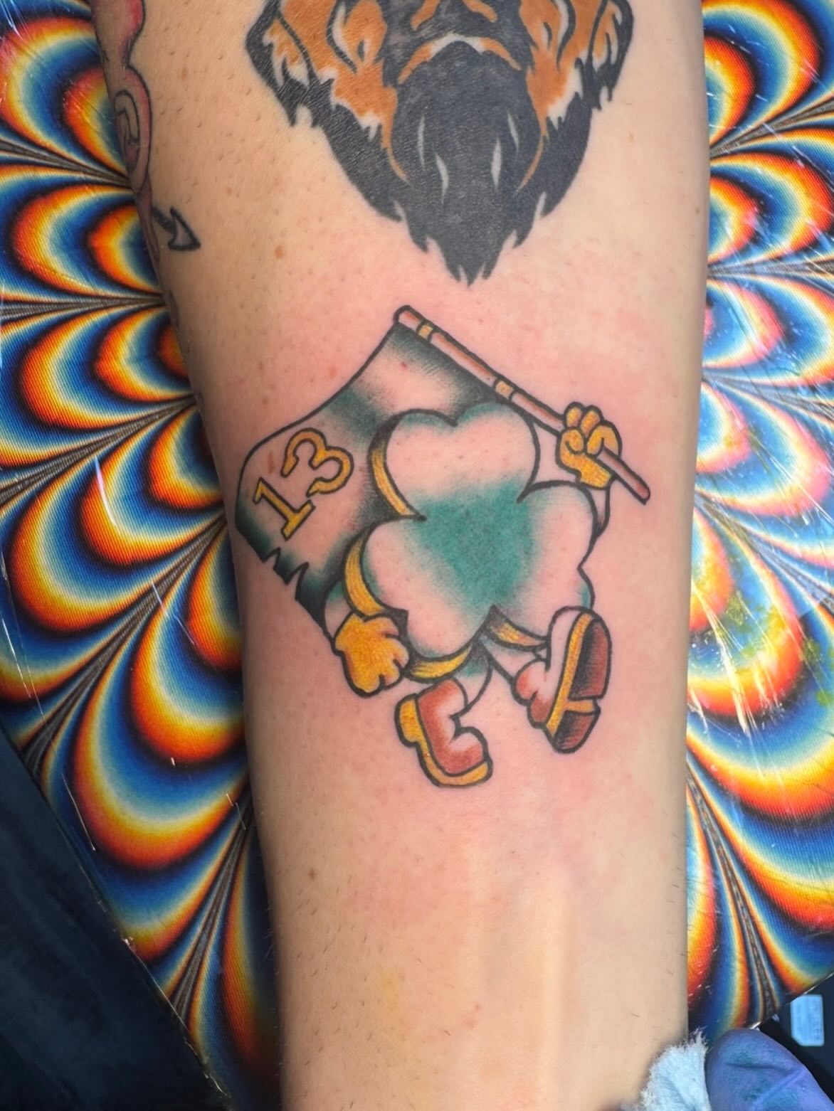 Playing clown American traditional tattoo on the forearm by Bradleigh Pretti🌟