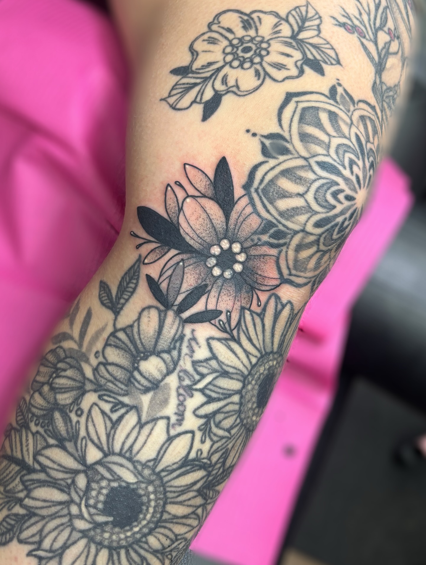 Floral arrangement black and grey tattoo on the forearm by ✿ sadie winter ✿