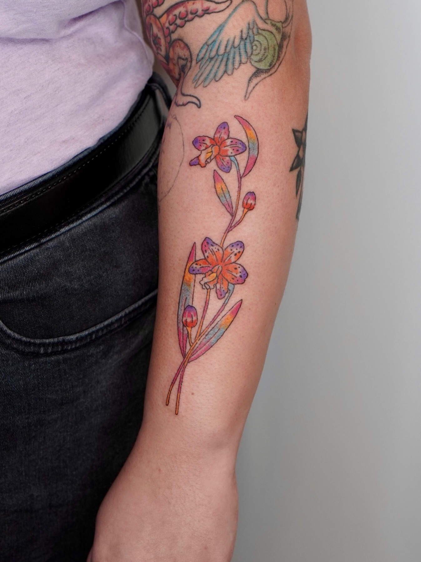 Flowers watercolor tattoo on the forearm by XINAMON 🔥 시나몬