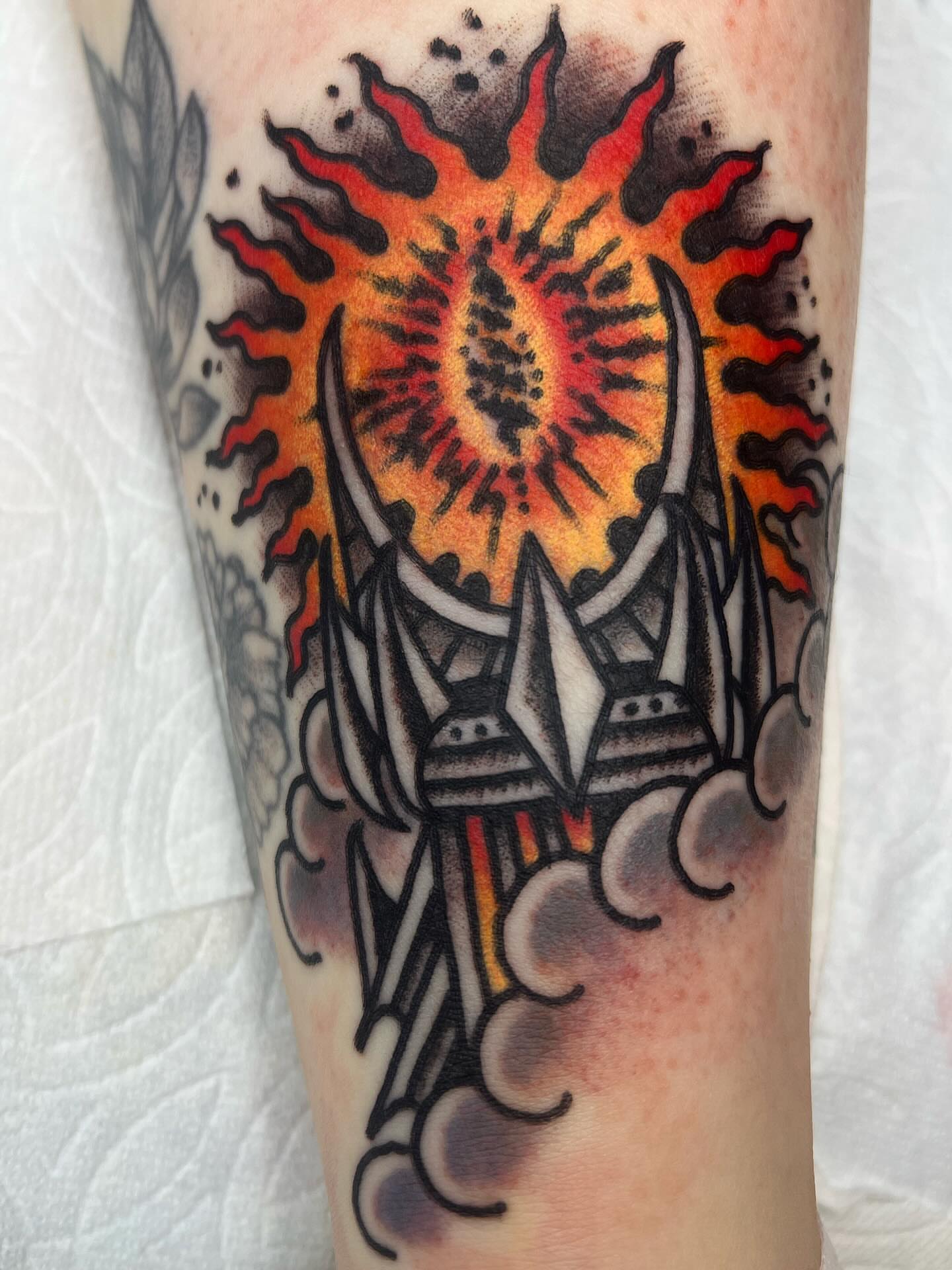 Castle with sunburst American traditional tattoo on the forearm by Leo 🌞 Pdx Tattoo