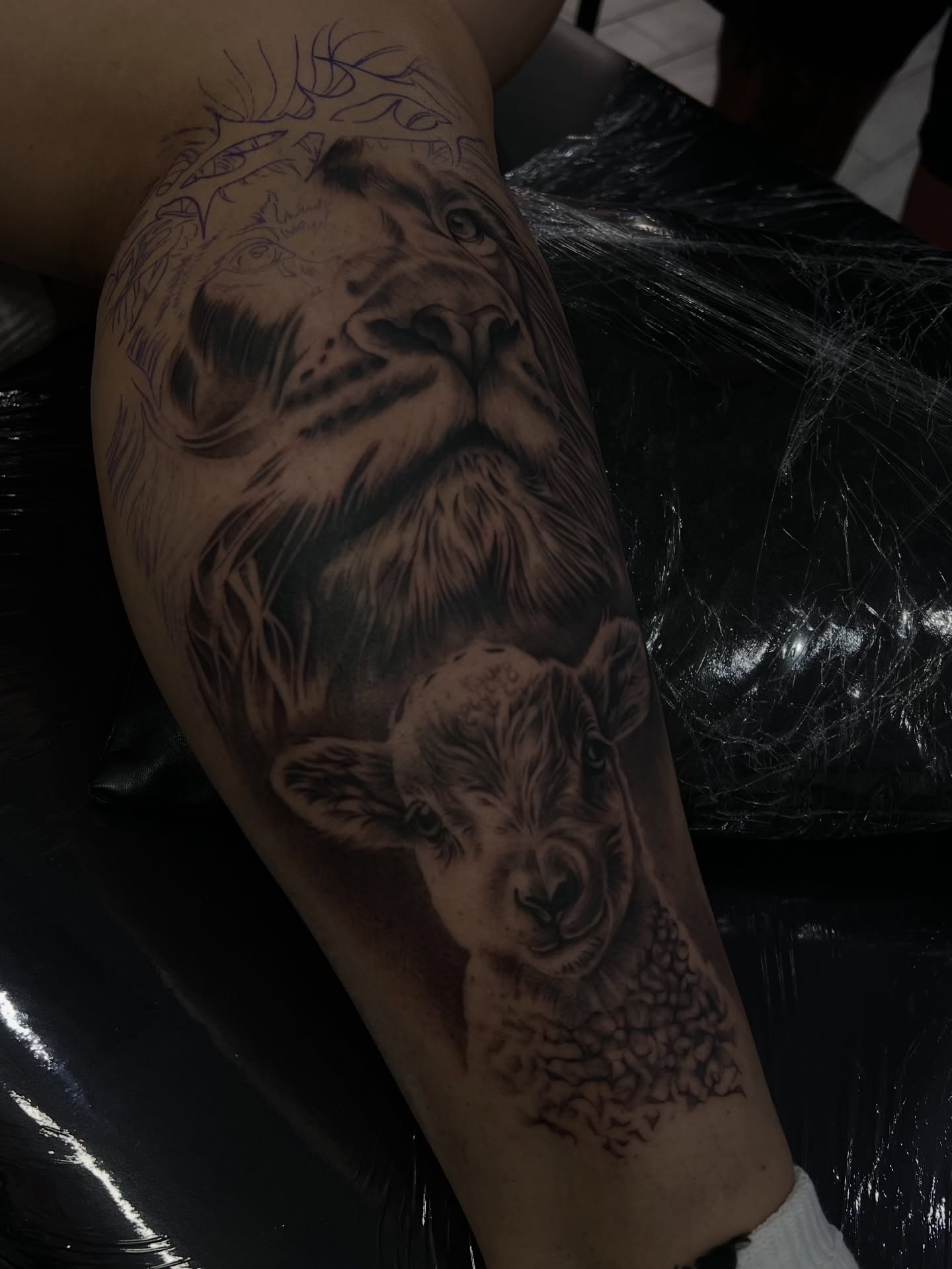 Lion and lamb realism tattoo on the forearm by Espi