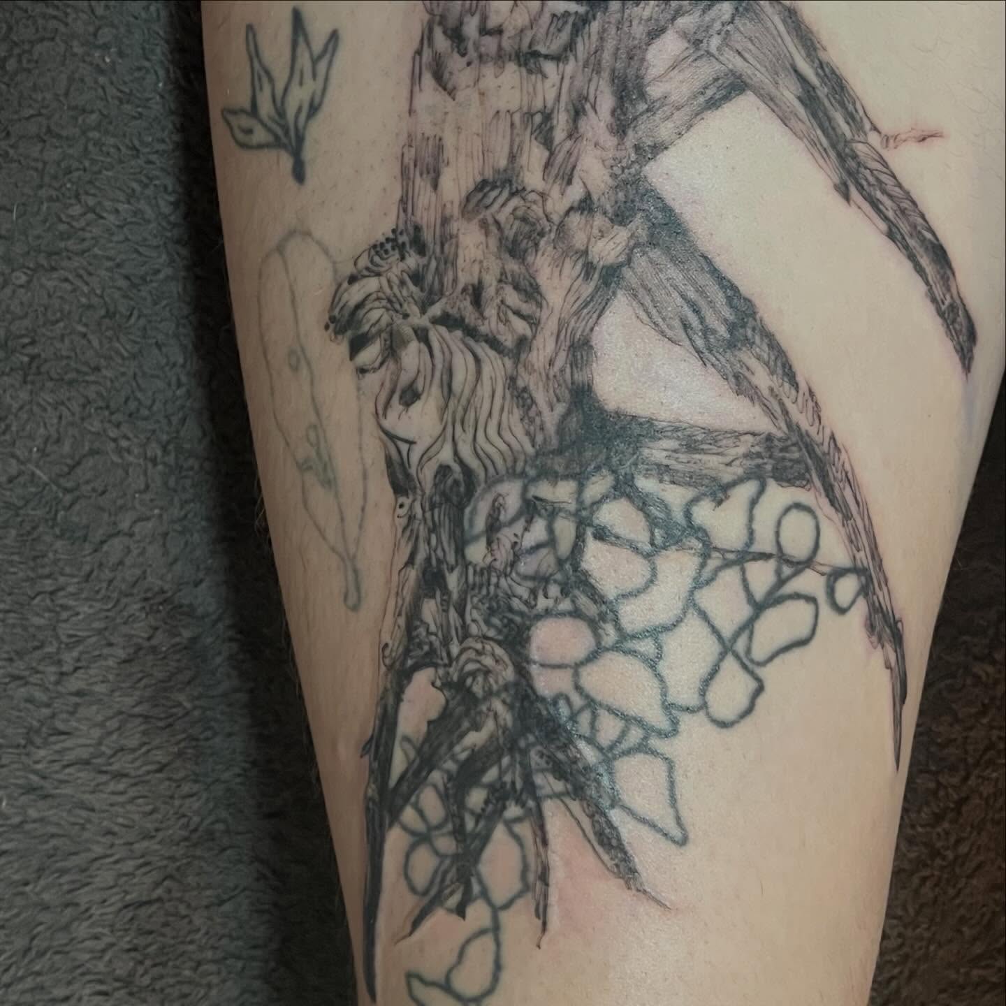 Bird and flowers realism tattoo on the forearm by ren