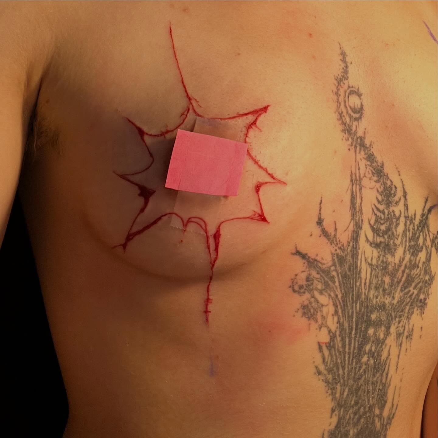 Tattoo black and grey tattoo on the chest by ren