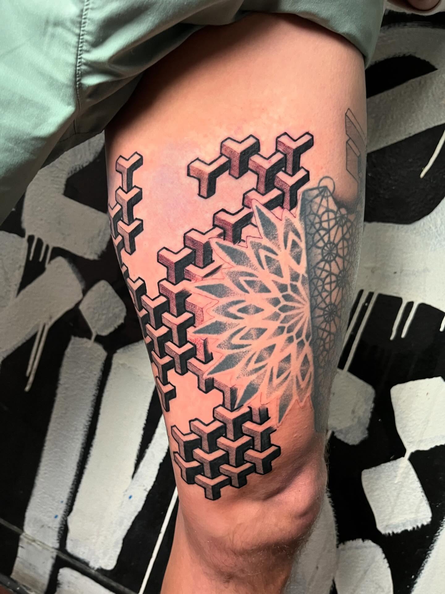 Geometric pattern geometric tattoo on the thigh by Nick Andrade Las Vegas Tattoo Artist