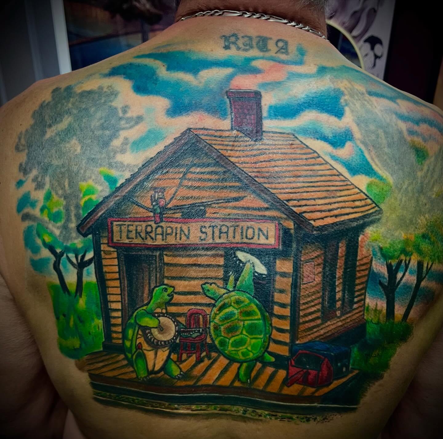 Terrapin Station realism tattoo on the back by Bobby Glennon
