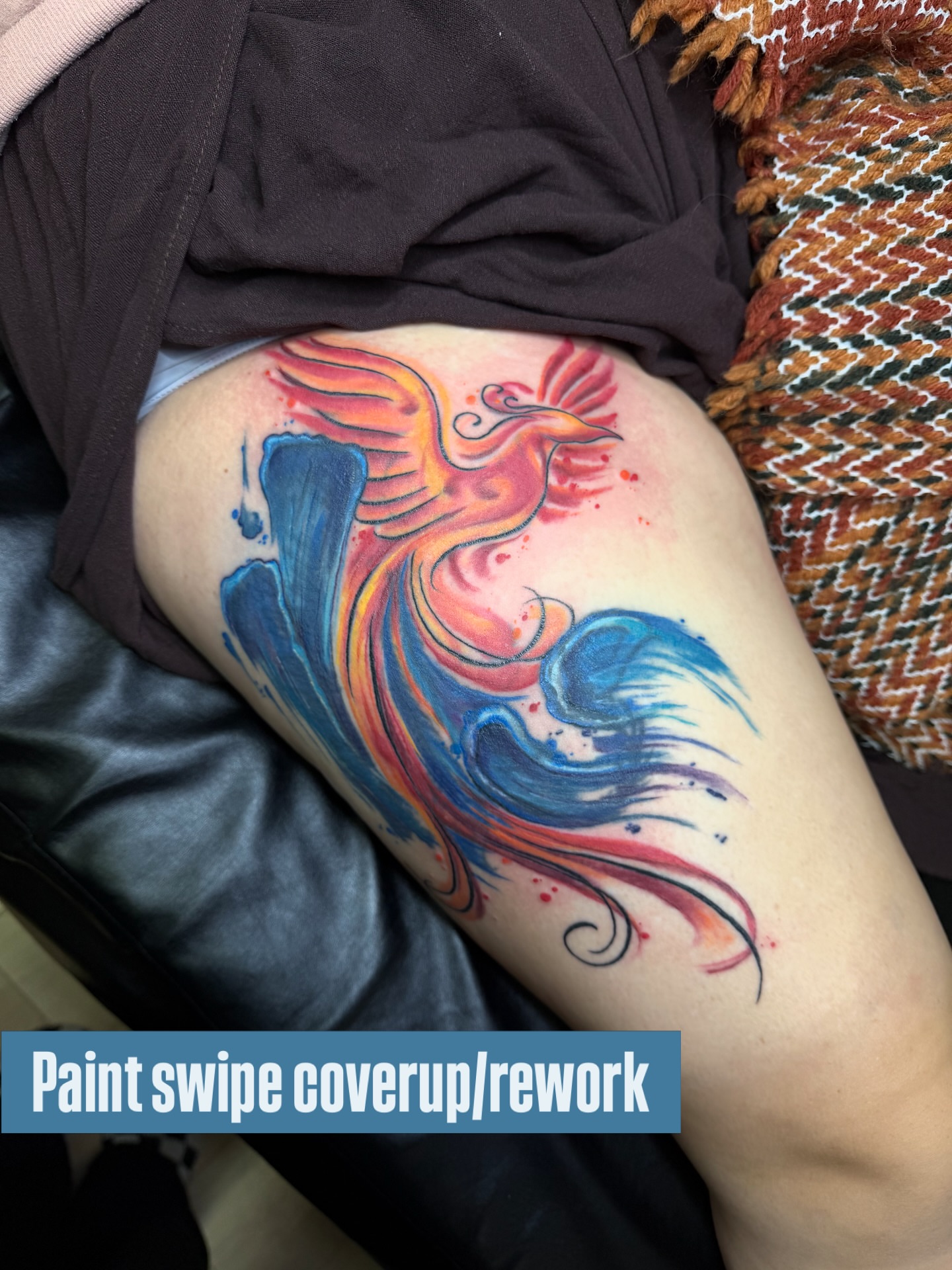 Phoenix watercolor tattoo on the thigh by Dani Fried Tattoos