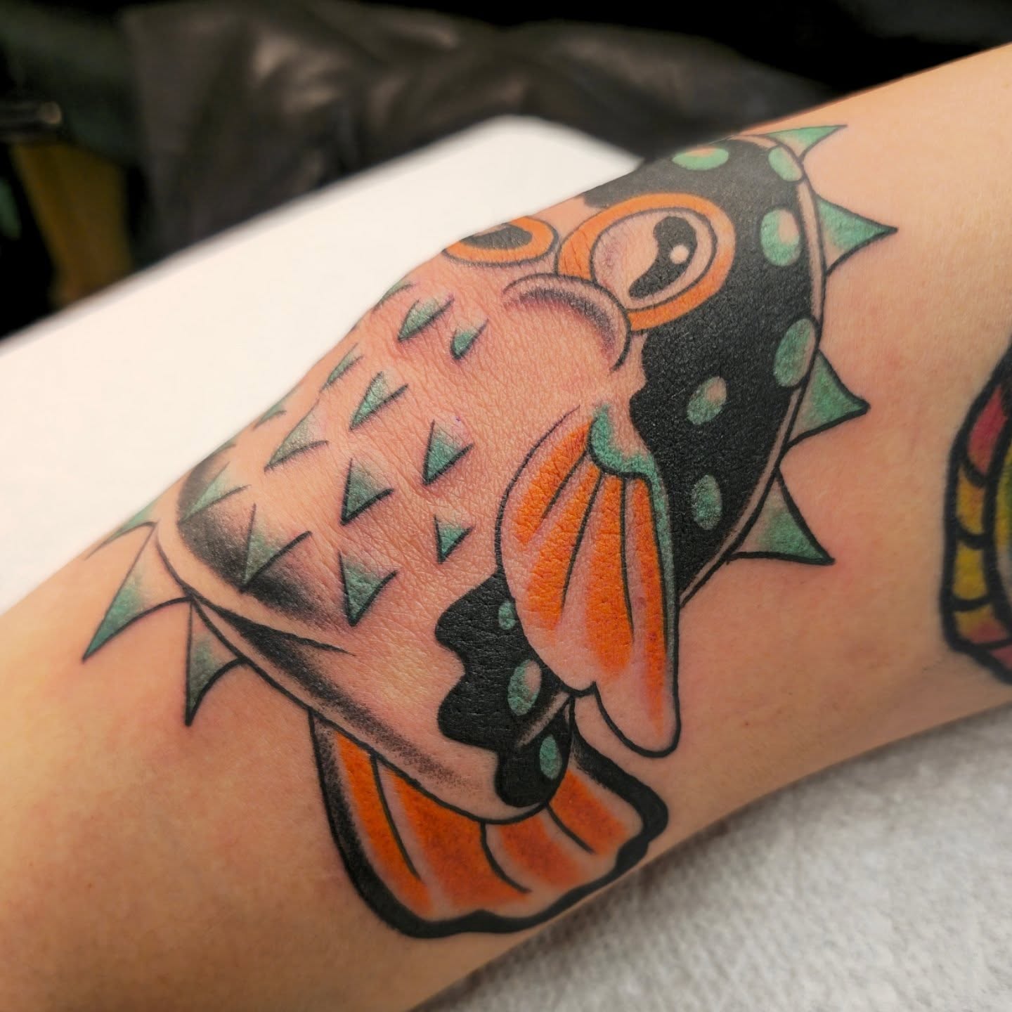 Puffer fish American traditional tattoo on the forearm by Tattoo Artist, Orange, California