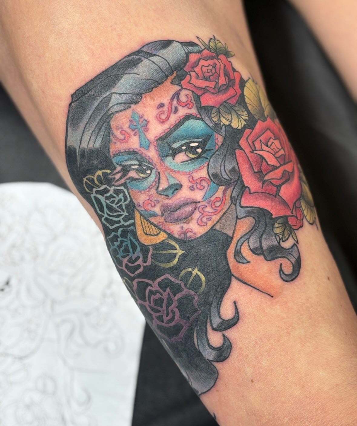Sugar skull American traditional tattoo on the forearm by Gabby