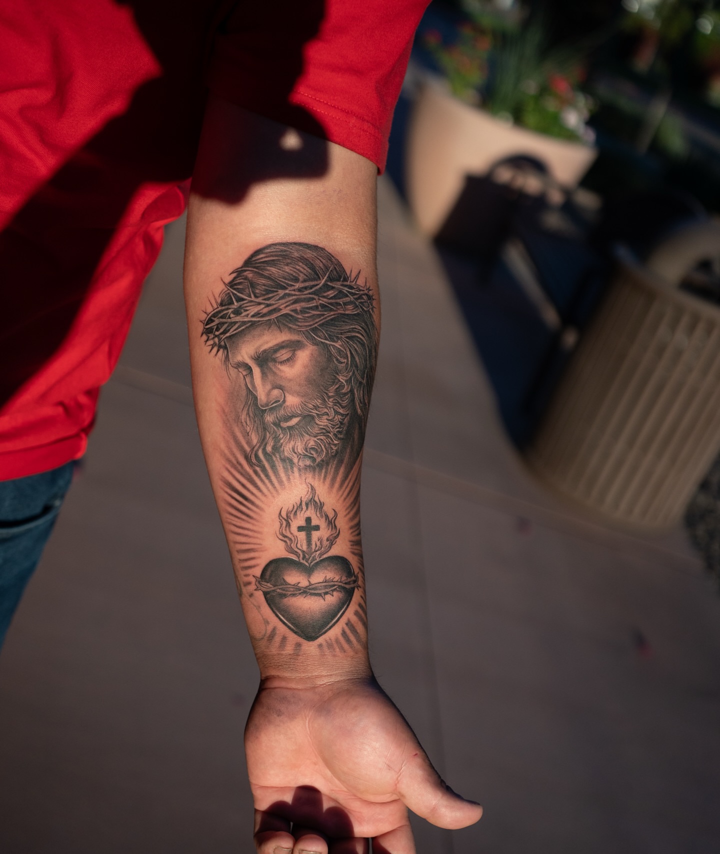 Jesus Christ realism tattoo on the forearm by Damon Valdez