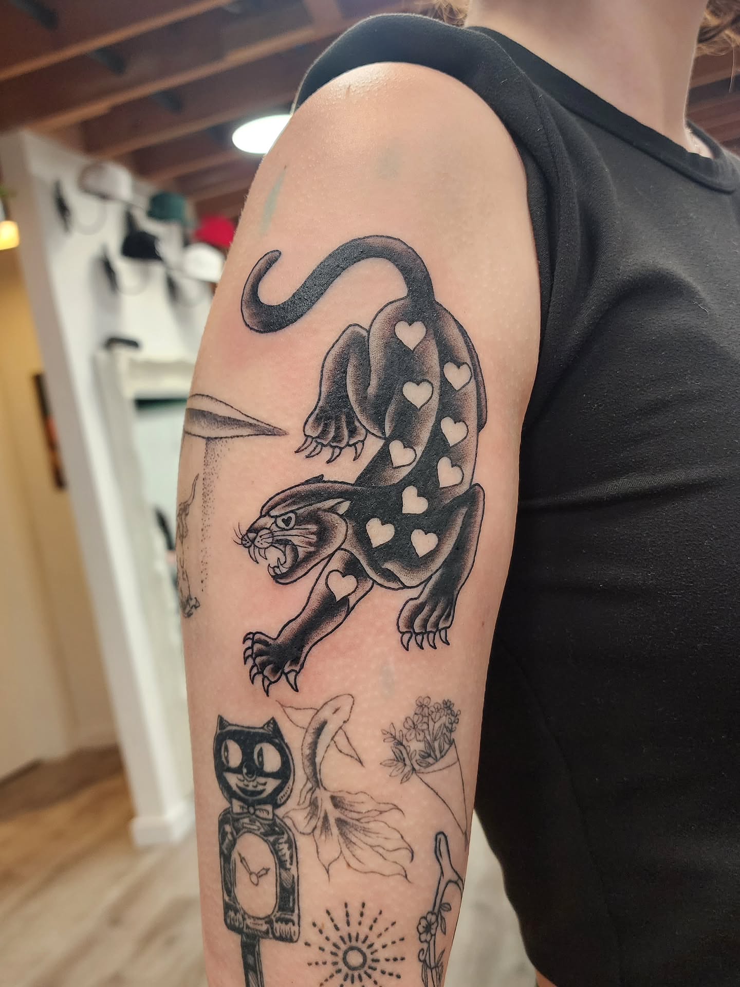Panthers and owl American traditional tattoo on the forearm by mikayla