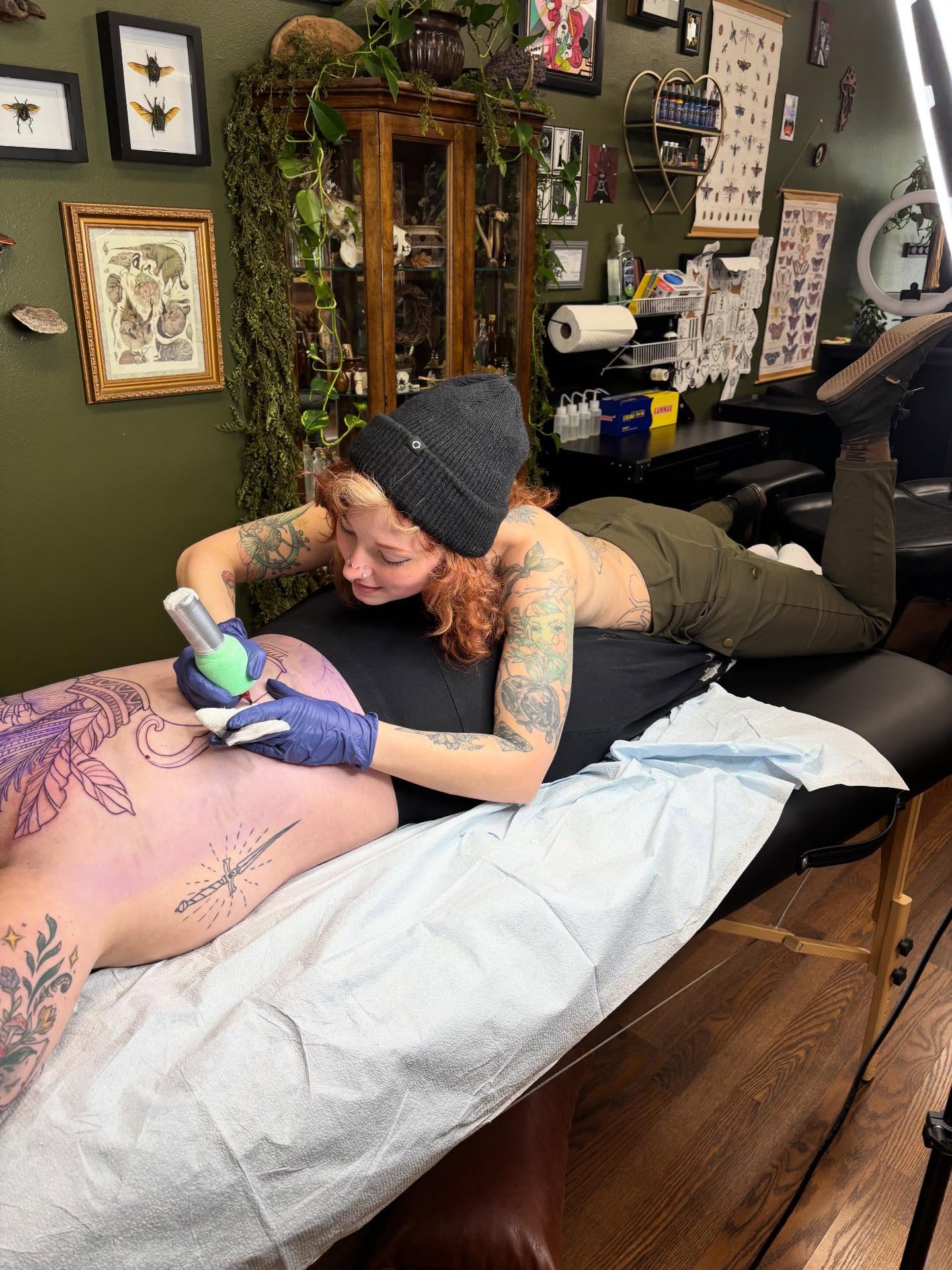 Floral design American traditional tattoo on the back by Wren Hollow, Portland, Oregon
