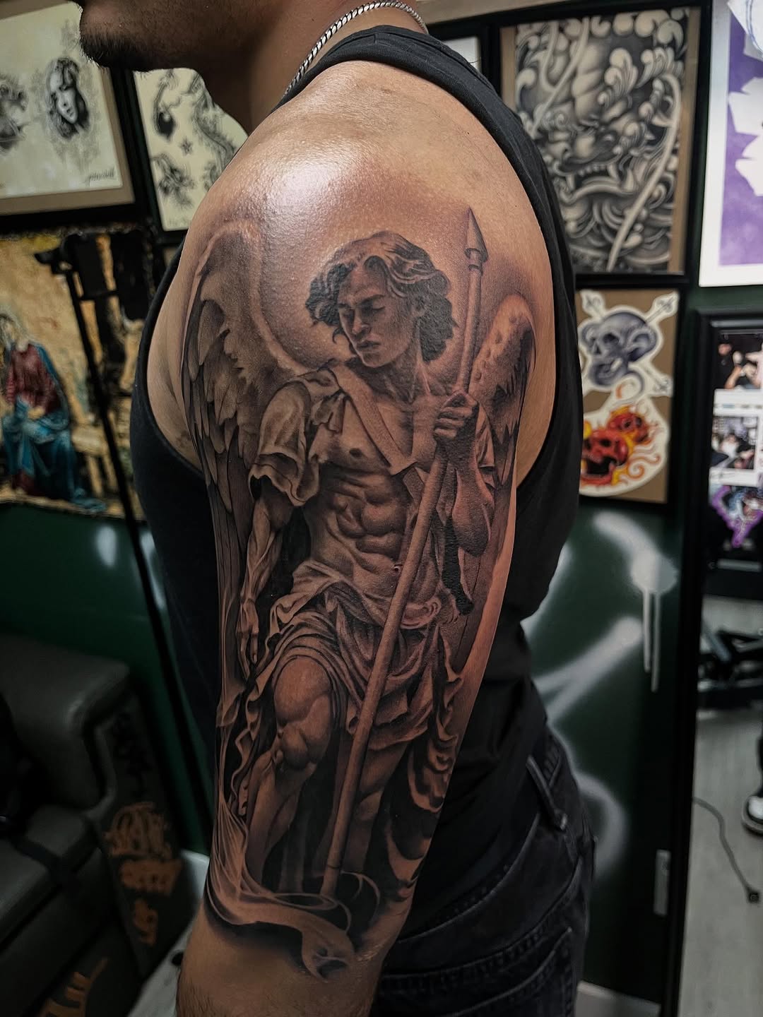 Angel with spear realism tattoo on the shoulder by Denver Tattoo Artist