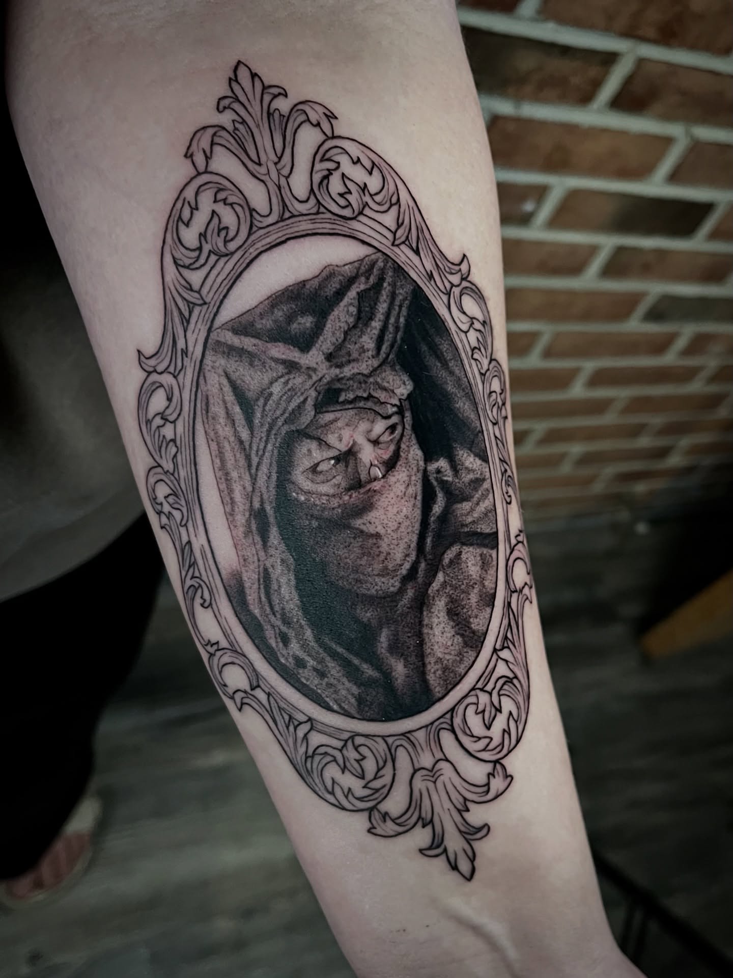 Portrait in mirror realism tattoo on the forearm by Taylor H, Plymouth Meeting, Pennsylvania