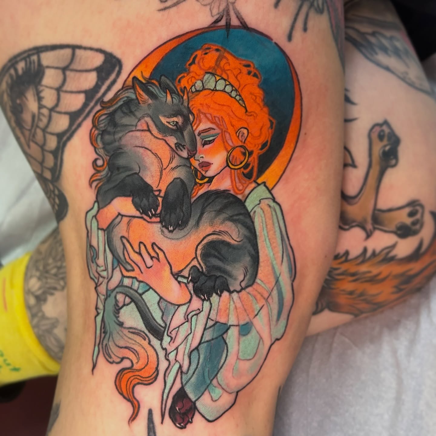 Woman with wolf new school tattoo on the thigh by Anna Sylvan Tattoos