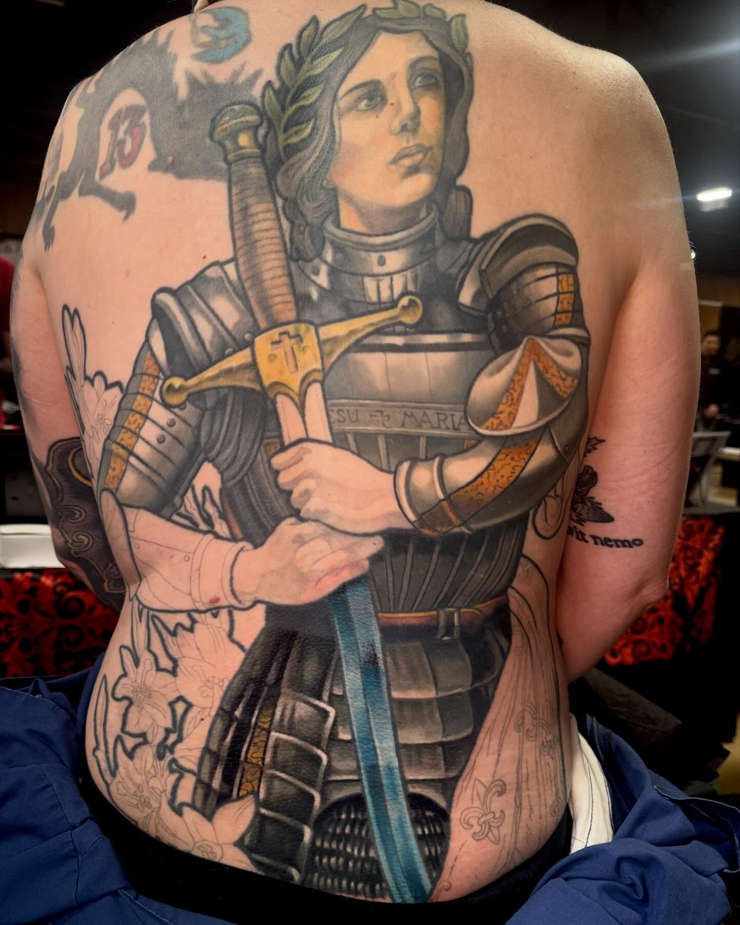 Knight in armor American traditional tattoo on the back by Realistic tattoos in Minneapolis, MN, Minneapolis, Minnesota