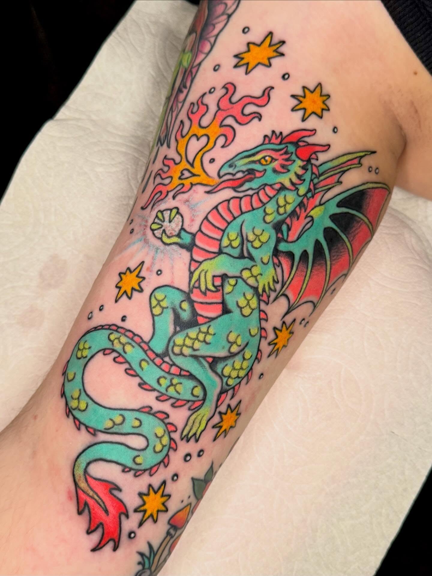 Dragon new school tattoo on the forearm by Painted Peach Tattooer