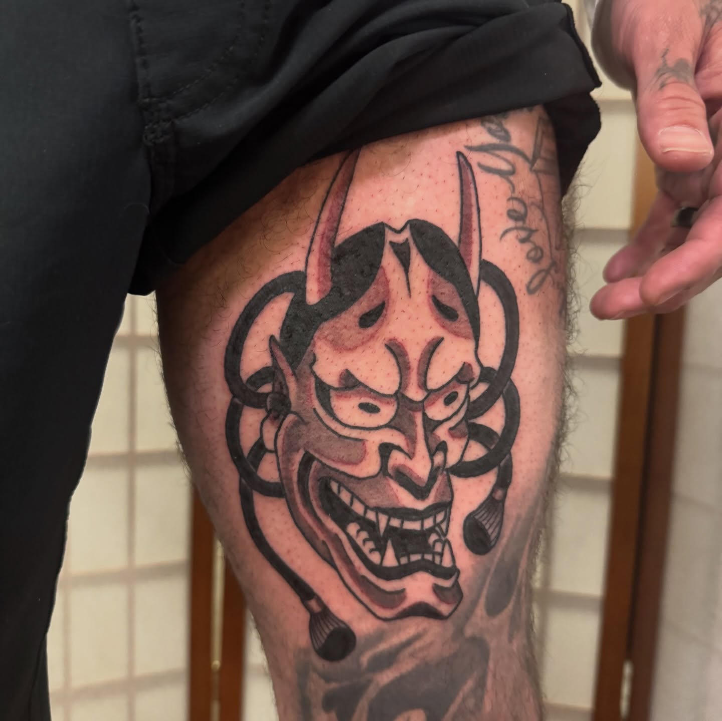 Demon mask japanese irezumi tattoo on the thigh by Dylan