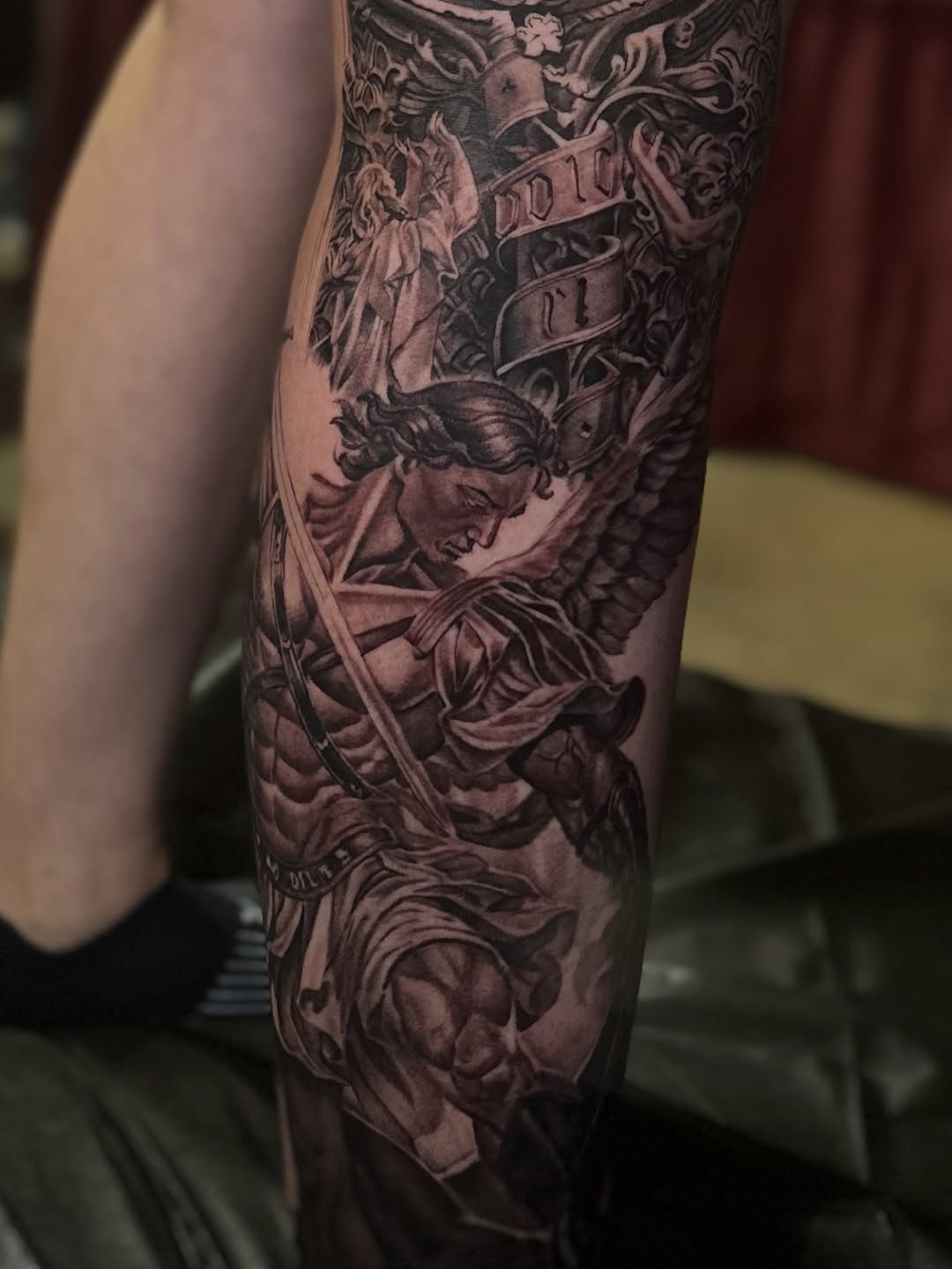 Tattoo by @vudoo_tattoo — realism, black_and_grey