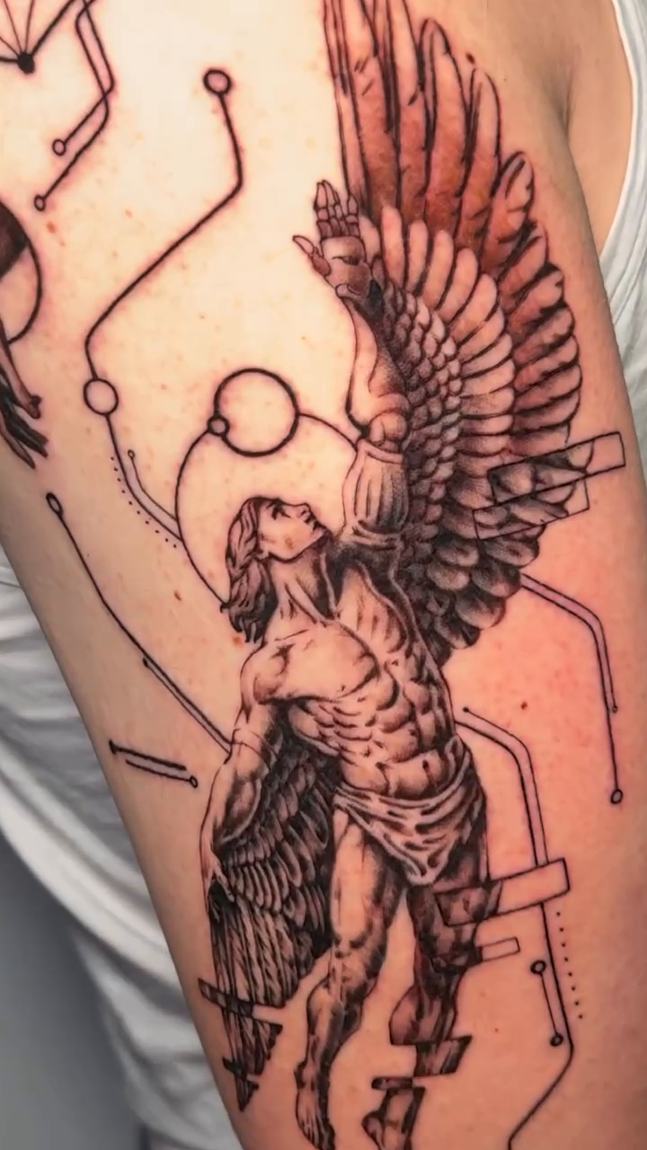 Winged figure with geometric elements realism tattoo by Moi Rivas, Salt Lake City, Utah