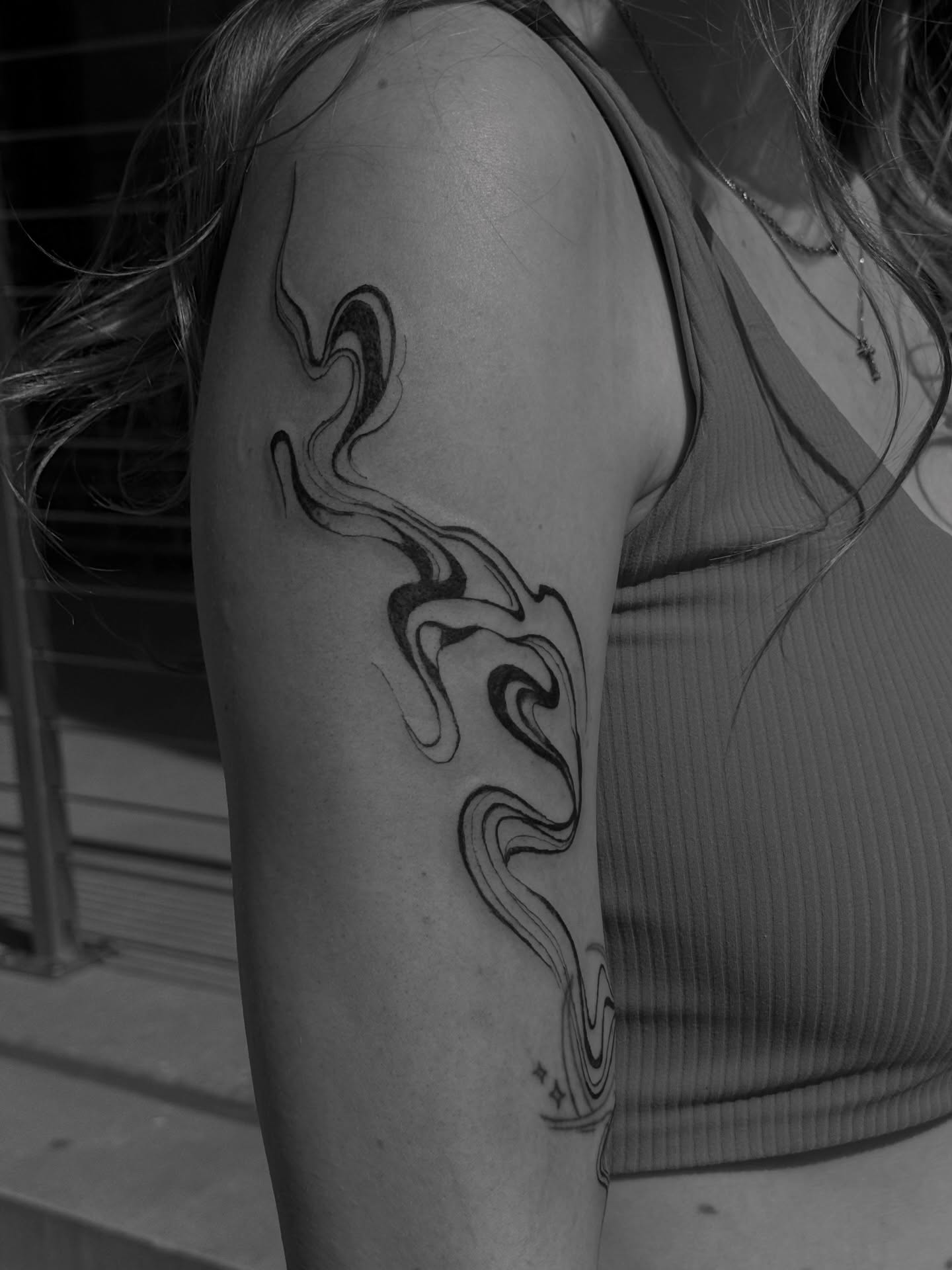 Smoke black and grey tattoo on the shoulder by Ryleigh Benjamin