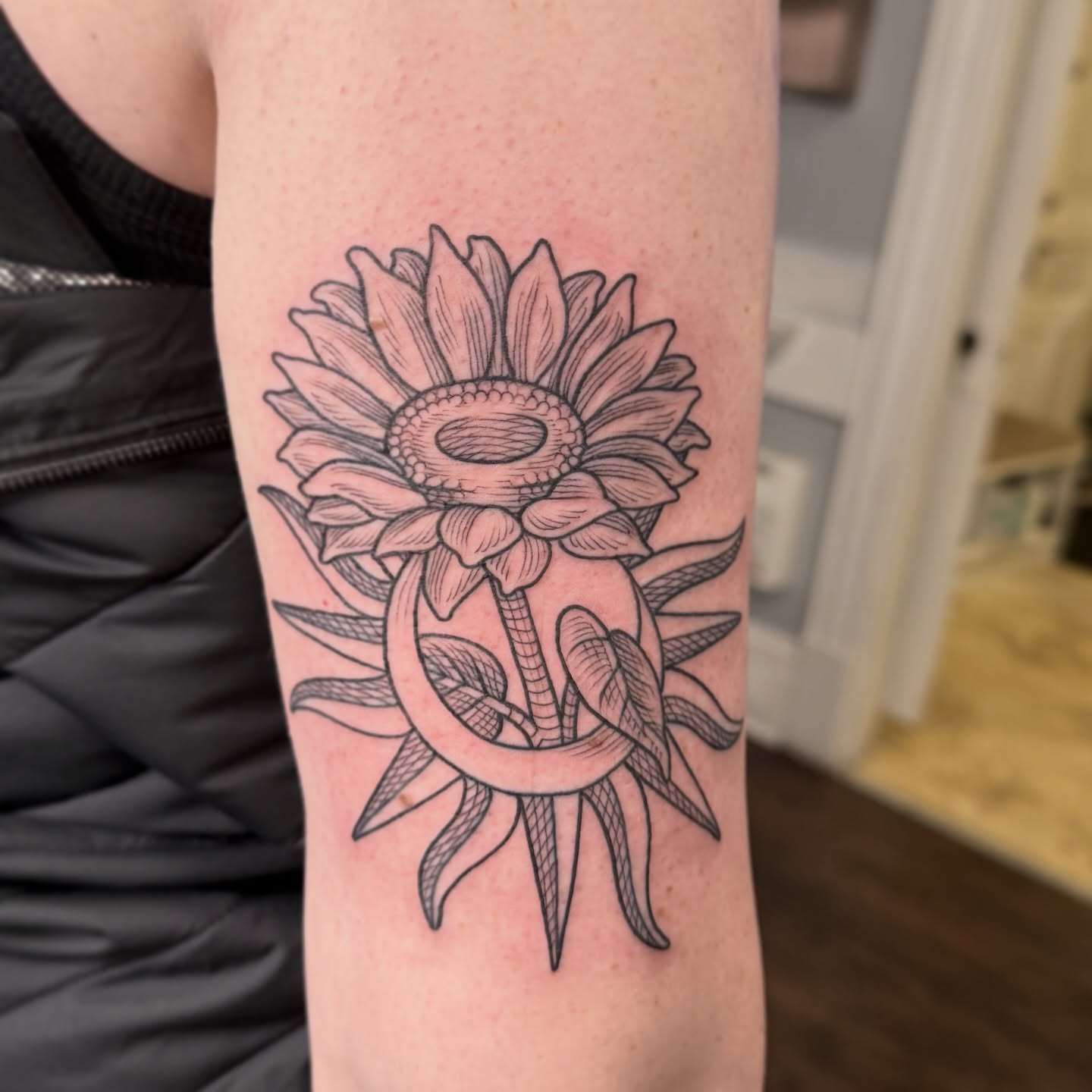 Sunflower black and grey tattoo on the forearm by Taylor 🍂☕️