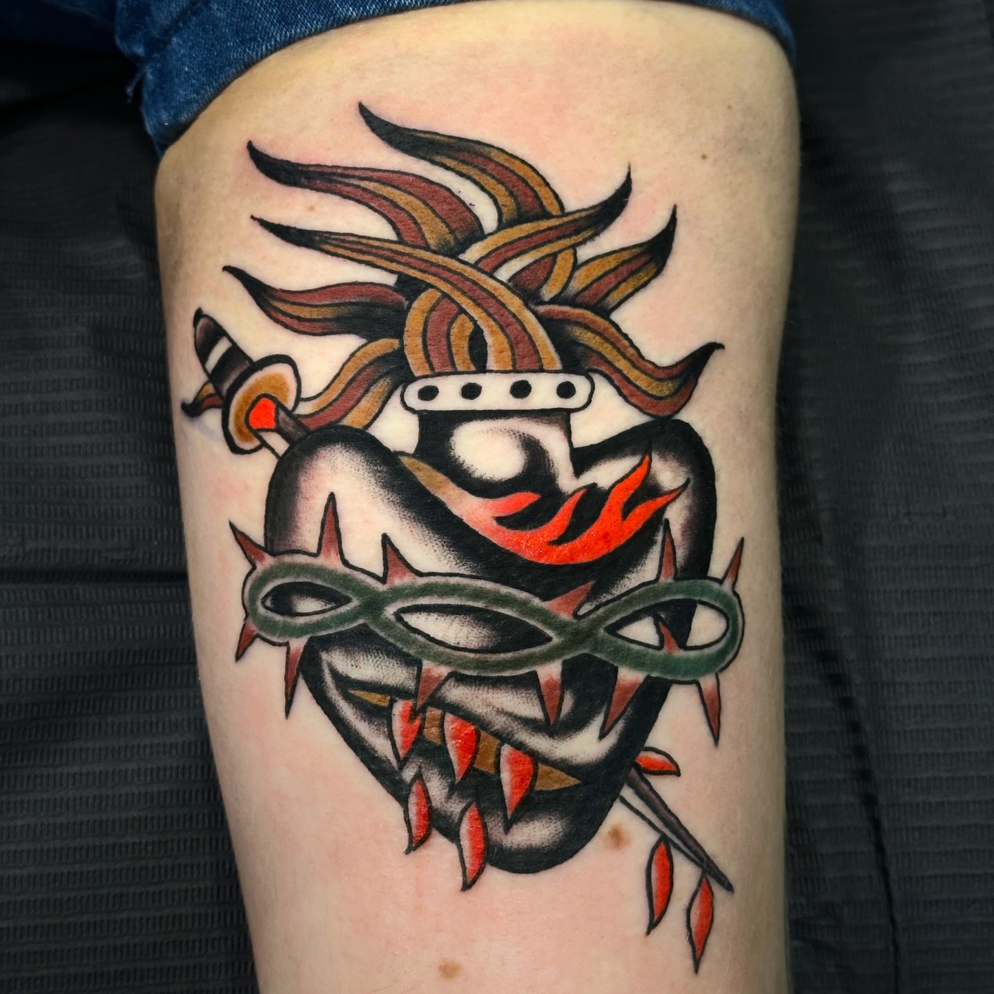 Demon mask American traditional tattoo on the thigh by A.j. Lingerfeldt, Nashville, Tennessee