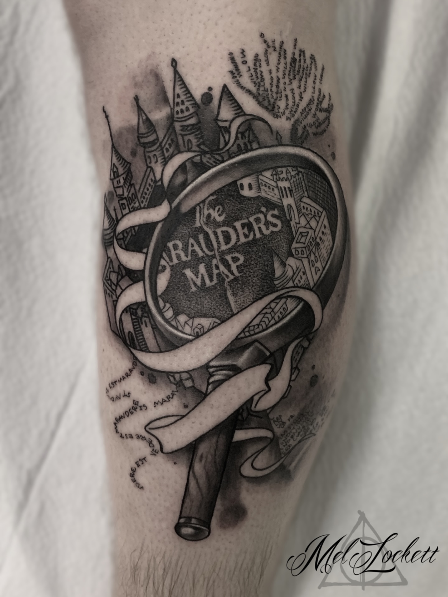 Raiders map black and grey tattoo on the forearm by Mel K Lockett - Nashville Tattoo Artist
