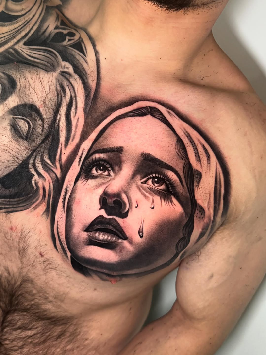 Tattoo by @saeso___ — realism, black_and_grey